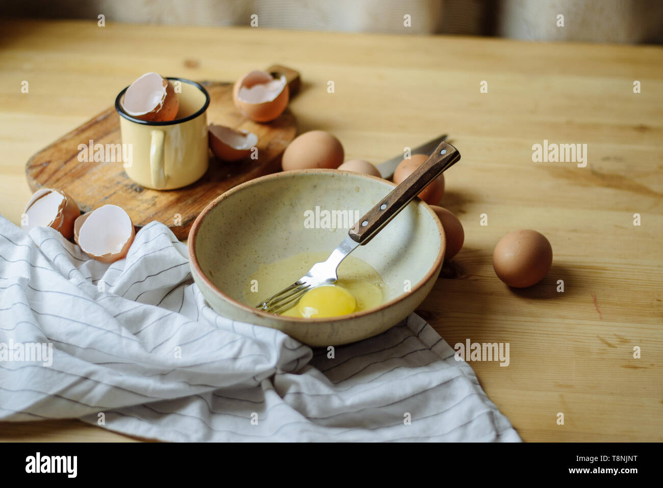 broken eggs in a plate. Beautiful still life, preparing for the text and cooking scrambled eggs Stock Photo