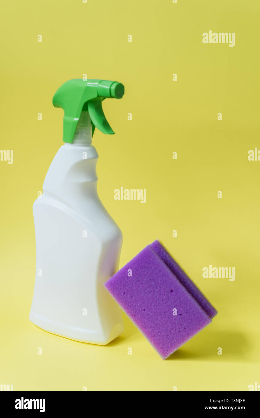 cleaning agent, house cleansing. Cleaning products on a bright yellow