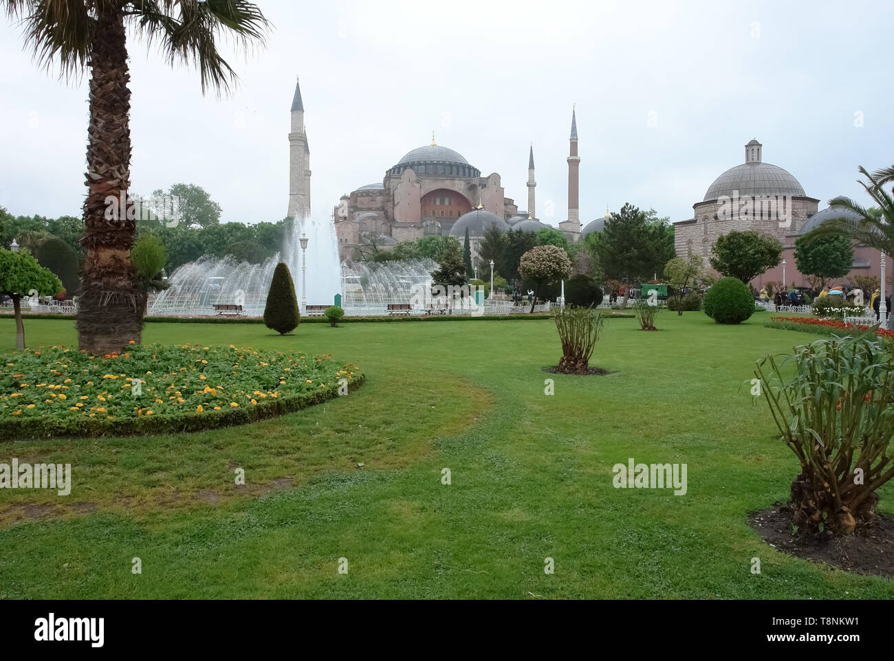 Istanbul, Turkey - April 26, 2008: View of the Hagia Sophia, a fountain and green lawn in Istanbul, Turkey. Stock Photo