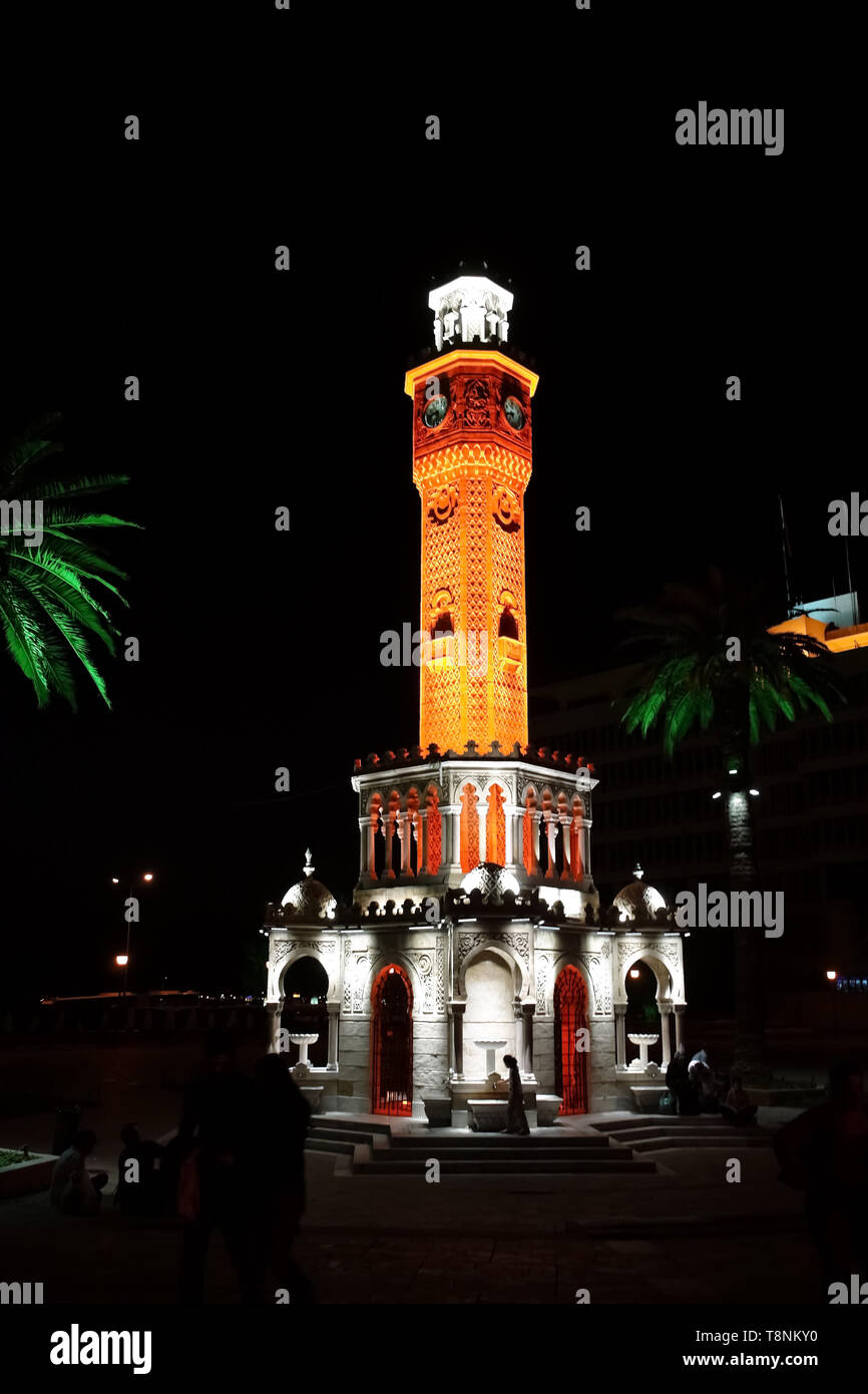 Izmir, Turkey - April 24, 2012: Symbol of the city Izmir and its most famous landmark the Clock Tower in the central square of Konak at night. Stock Photo
