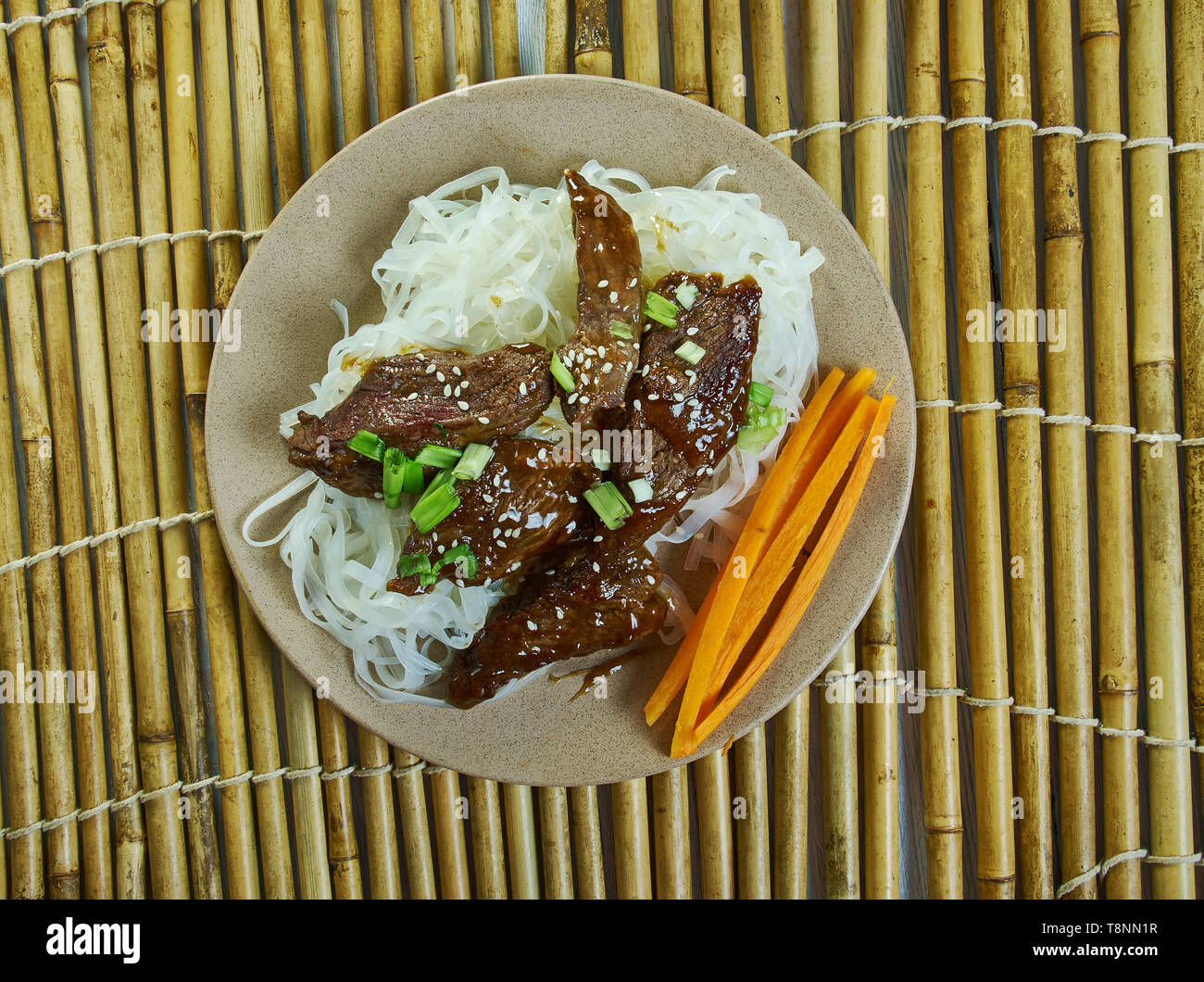 Honey Sriracha Mongolian Beef with Rice Noodles Stock Photo Alamy