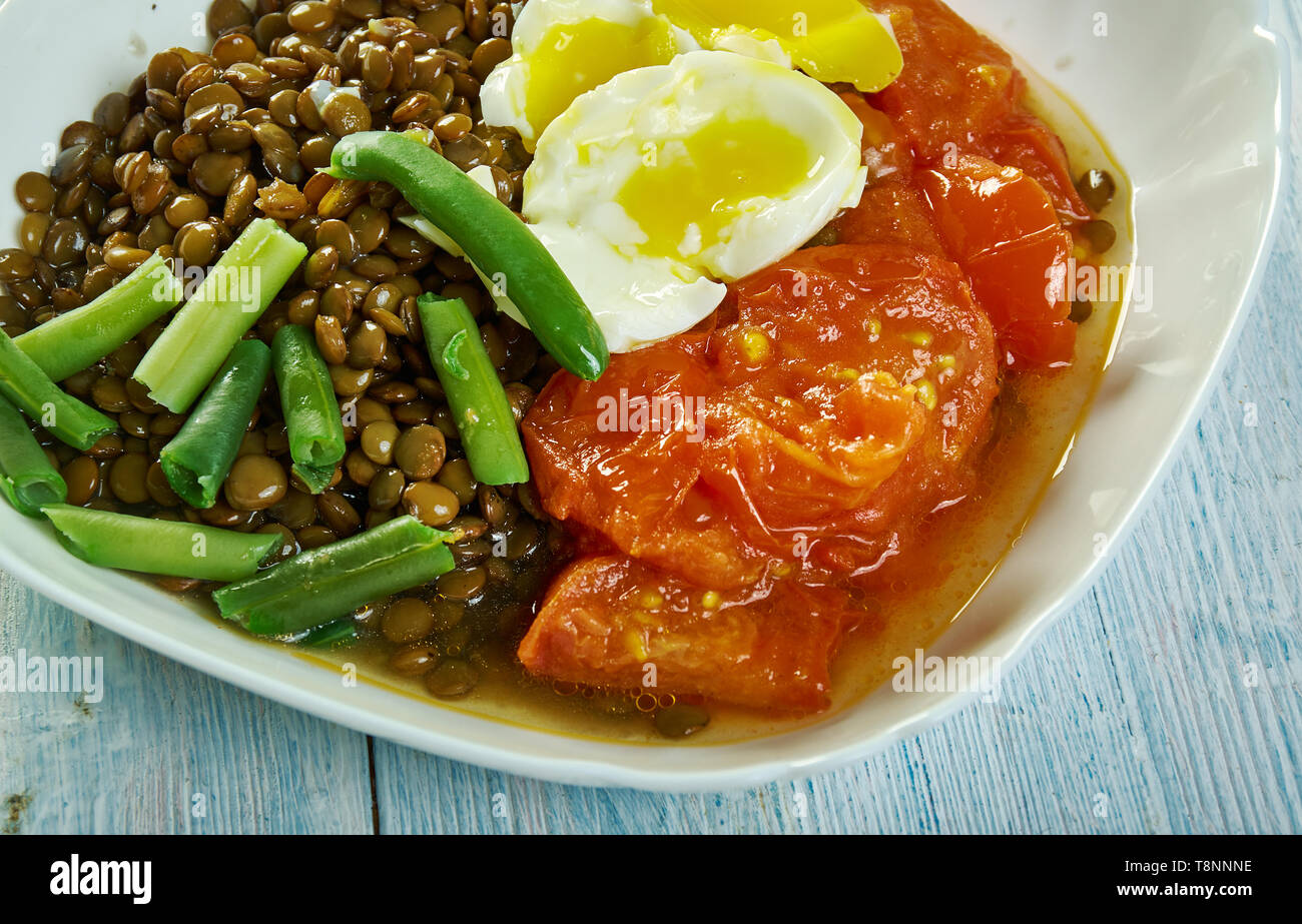 Roast Tomatoes and Lentils With Dukka Crumbed Egg Stock Photo Alamy