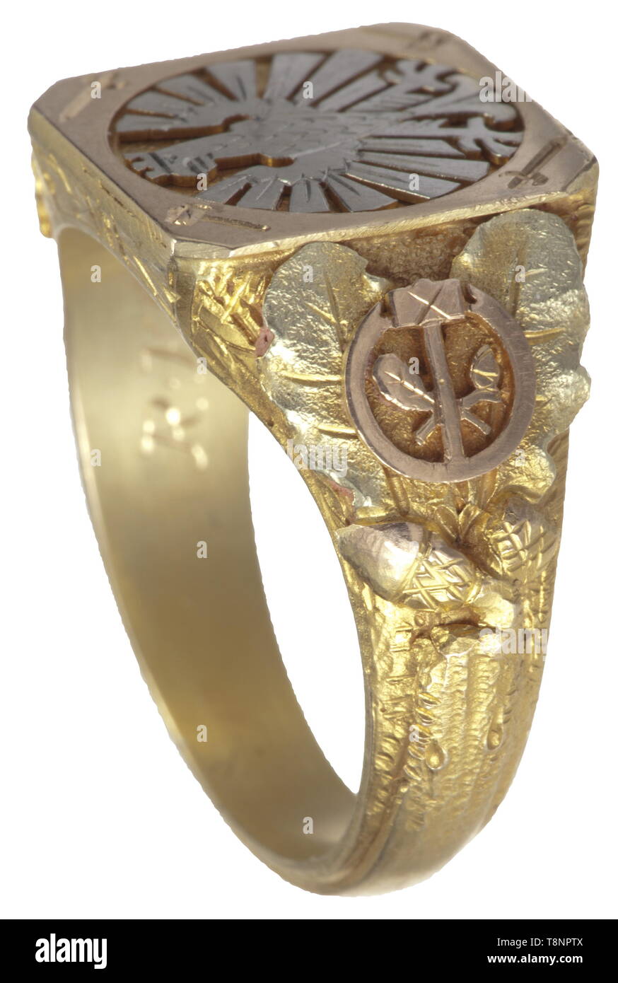 An honour ring of the 'City of German Crafts', Frankfurt on the Main Elaborate jeweller's work in various gold tones, the quadrangular plate on the obverse inlaid with a Frankurt eagle in white gold and alternately sword and hammer at the corners, the sides with separately applied golden oak leaves and acorns (some removed due to usage) and the emblems of the DAF and the Crafts Association, respectively, in red gold. The inner surface is engraved with 'Ehrengabe der Stadt des Deutschen Handwerks' and 'R.H.T. 1936' with fineness punch '585' and master's mark 'JF' for Frankfu, Editorial-Use-Only Stock Photo