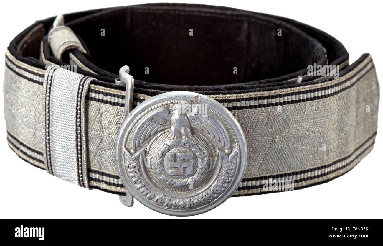A waist belt for the black dress uniform for leaders Aluminium brocade with woven-in SS runes between oak leaf branches and doubled black edge trim, black velvet liner (light damage). Complete with both slides, aluminium buckle and pressure hook. The buckle (diametre 50 mm) with stamped motto, national symbol and reverse stampings 'RZM', 'SS', '36/39' and 'OLC' (Overhoff & Cie, Lüdenscheid). Signs of use and age. Length 102 cm. Rare. historic, historical, 20th century, 1930s, 1940s, Waffen-SS, armed division of the SS, armed service, armed services, NS, National Socialism, , Editorial-Use-Only Stock Photo