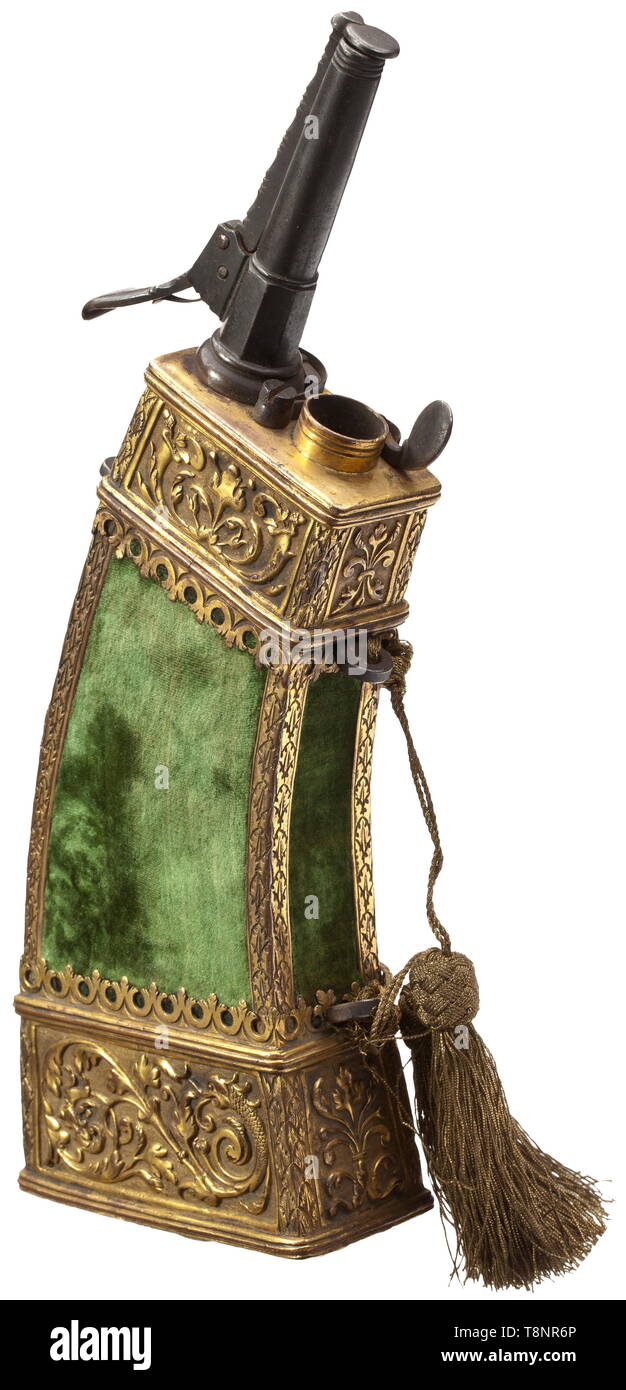 A South German powder flask, circa 1620 Wooden body covered with velvet with fire-gilt copper mountings. The fittings with tendril-shaped, chased Renaissance motifs in relief against a matt background. Iron spout with two spring-loaded closures and a closable refill opening on top. On the reverse side an iron belt hook. New velvet cover, attached carrying cord of later date. Length 30 cm. historic, historical, handgun, firearm, fire arm, firearms, fire arms, gun, guns, hand weapon, hand weapons, object, objects, stills, 17th century, Additional-Rights-Clearance-Info-Not-Available Stock Photo