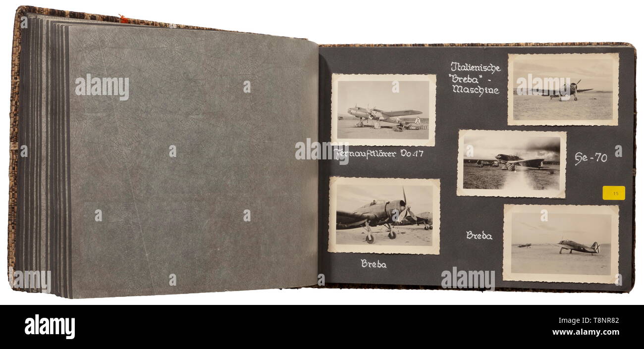 Two photo albums of the Spanish Civil War (1936-39) - Condor Legion 315 first rate technical, battle and terrain images. The albums are very well-inscribed, the photos affixed using adhesive corners. Numerous images of trucks and tanks in the field, aircraft (Me 109, He 111 etc.), cities and villages in Spain (Taragona, Olot, Barcelona, Sababell, Toledo, Madrid among others). Also, bunkers and positions, troop build-ups, destroyed buildings and vehicles, battles on all fronts up to the peace agreement and following journey home by German ships. Rare photos from the period o, Editorial-Use-Only Stock Photo