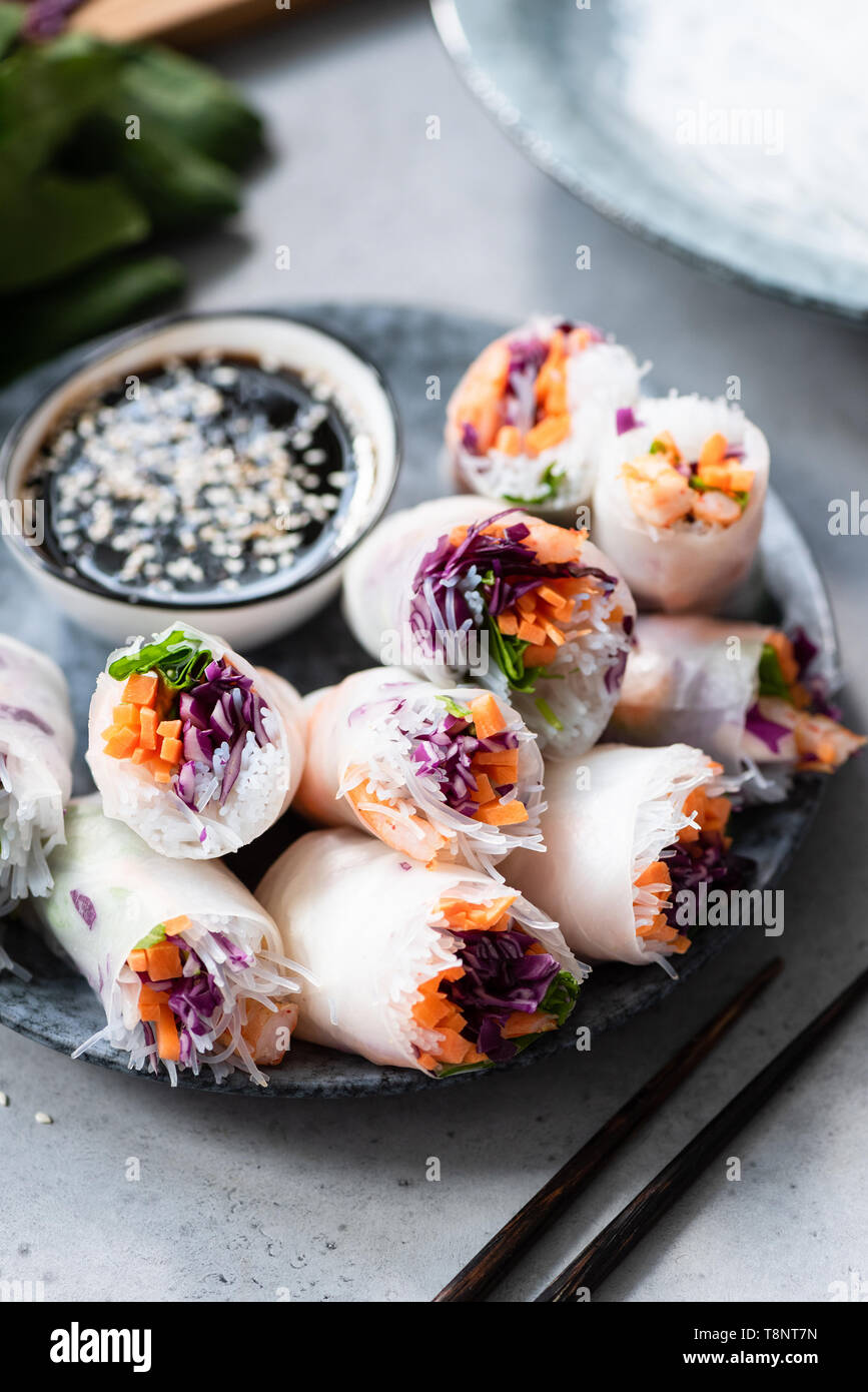 Vietnamese Asian Spring Rolls Or Rice Paper Rolls Stuffed With Red Cabbage, Shrimps, Glass Rice Noodles And Carrot Stock Photo