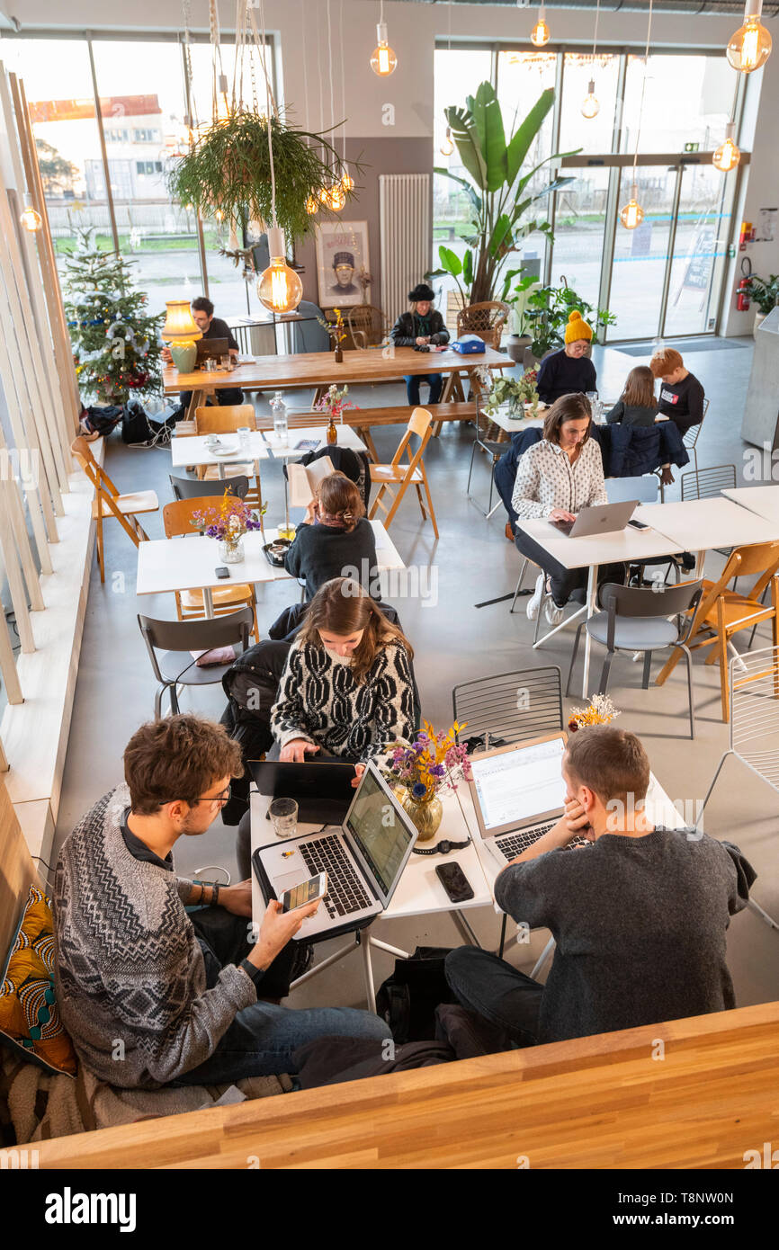 Offices, coworking spaces on the river island of Nantes (north-western France), Zero Newton building Offices for coworkers, coworking spaces: people s Stock Photo