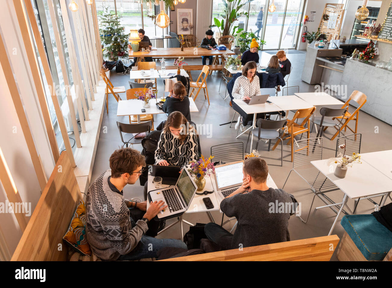 Offices, coworking spaces on the river island of Nantes (north-western France), Zero Newton building Offices for coworkers, coworking spaces: people s Stock Photo