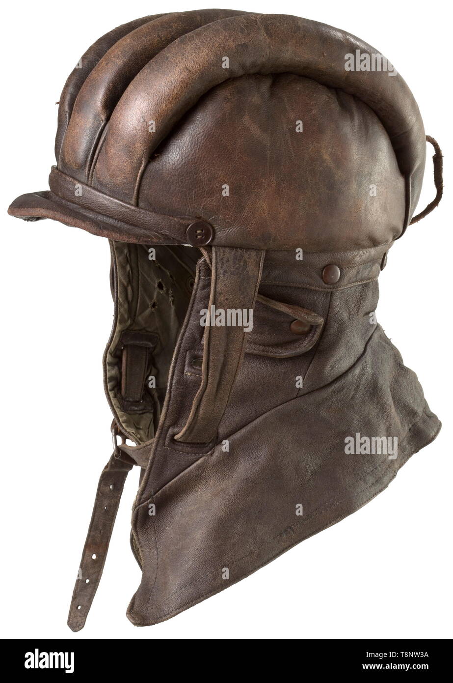 A protective leather helmet for balloon observers Brown leather. Three padded rolls at top, ear flaps with press button closure at sides, leather visor. Removable neck guard, seven brown lacquered iron press buttons. Chinstrap with metal loop. Leather loop for fastening of aviator goggles at back. Grey-green wool lining, brown leather sweatband. No maker's mark visible. The helmet resembles the helmets worn in the Prussian flying corps. The balloon observers were used as the artillery's 'eye'. At the beginning of the First World War, they were the primary target of the enem, Editorial-Use-Only Stock Photo