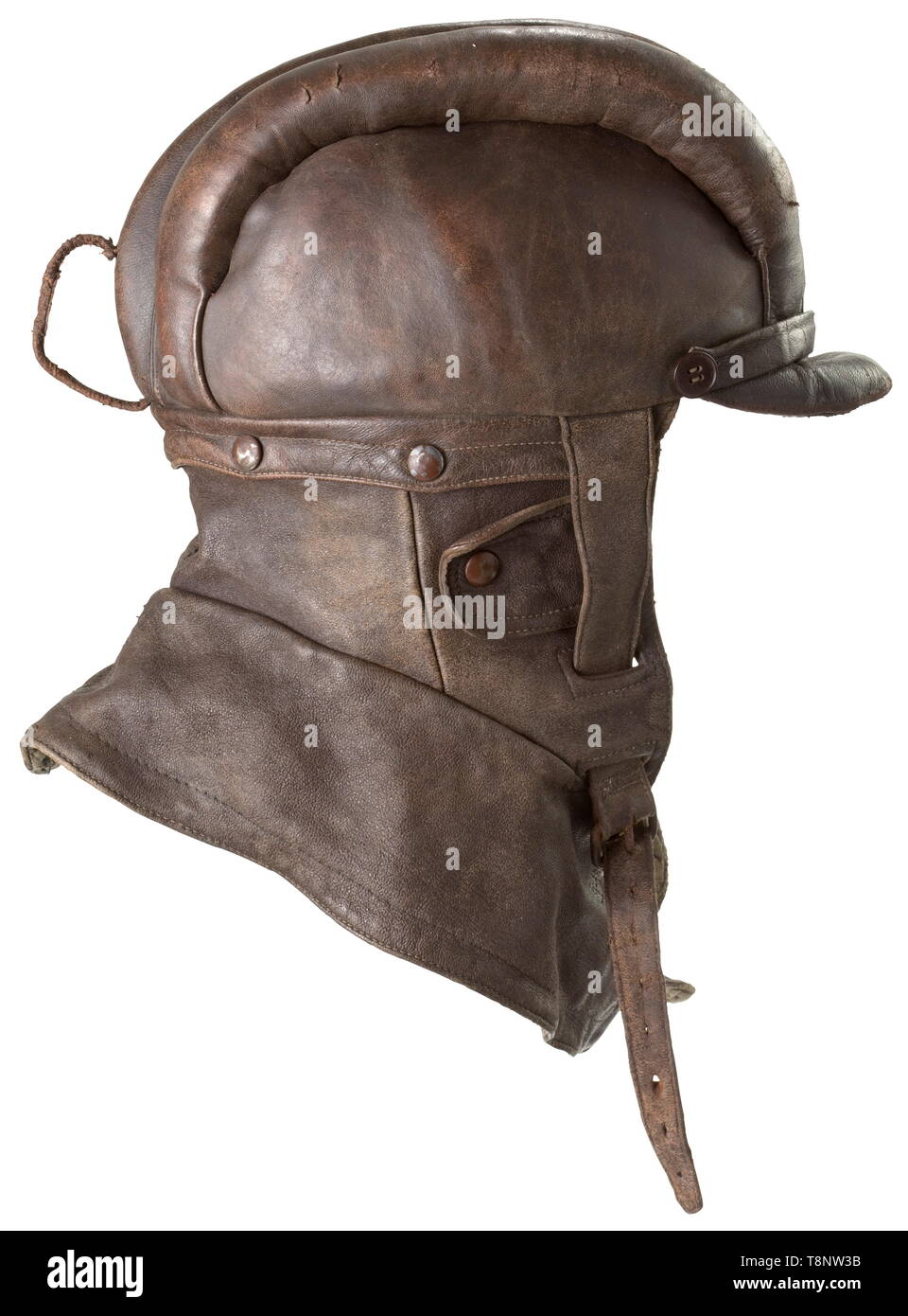 A protective leather helmet for balloon observers Brown leather. Three padded rolls at top, ear flaps with press button closure at sides, leather visor. Removable neck guard, seven brown lacquered iron press buttons. Chinstrap with metal loop. Leather loop for fastening of aviator goggles at back. Grey-green wool lining, brown leather sweatband. No maker's mark visible. The helmet resembles the helmets worn in the Prussian flying corps. The balloon observers were used as the artillery's 'eye'. At the beginning of the First World War, they were the primary target of the enem, Editorial-Use-Only Stock Photo