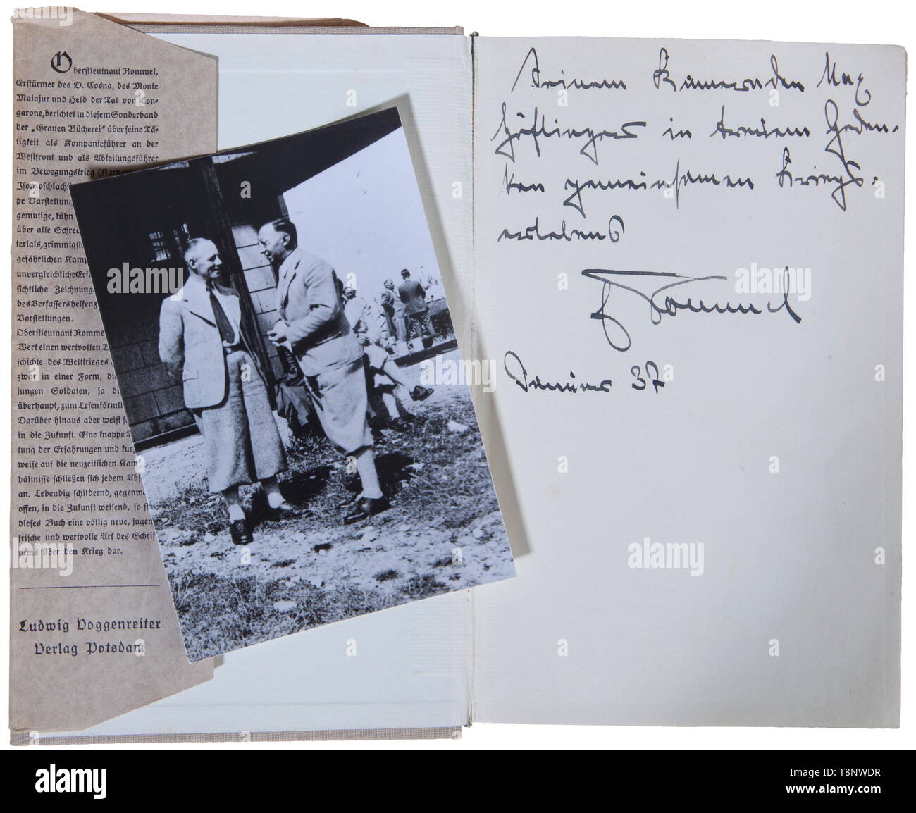 A dedicated copy of Rommel's 'Infanterie greift an' Written in 1937 by Oberstleutnant Erwin Rommel, 357 pages, war experiences and infantry tactics with some illustrations. Dedicated to his comrade Hoflinger, remembering the holiday in the mountains Dec. 1937, signed, with photo of Rommel and Hoflinger in civil dress in front of retreat. Dimensions 9 x 12,5 cm. Dust cover damaged. USA-lot, see page 5. historic, historical, 20th century, Additional-Rights-Clearance-Info-Not-Available Stock Photo