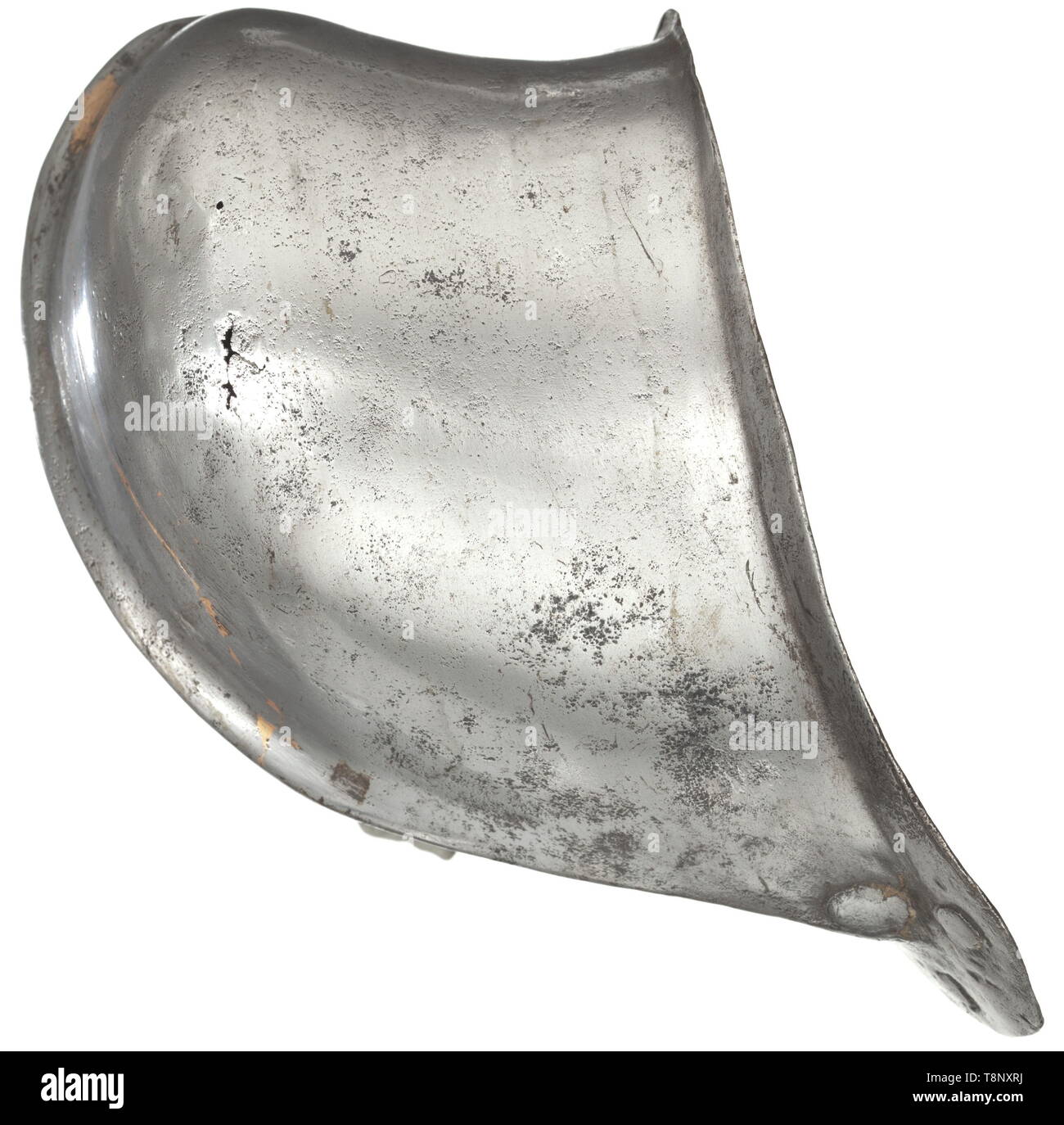 A German codpiece, circa 1560/70 One-piece, chased iron codpiece with raised central ridge and slightly flared rim. The top and bottom with two closed fastening holes each. Old copper solder repair, small corrosion holes at the side. Dimensions 14 cm. Rare piece of armour. Only few suits of armour have retained their original codpieces, as these parts were mostly removed in museums and private collections during the prudish 19th century. historic, historical, defensive arms, weapons, arms, weapon, arm, fighting device, object, objects, stills, cl, Additional-Rights-Clearance-Info-Not-Available Stock Photo