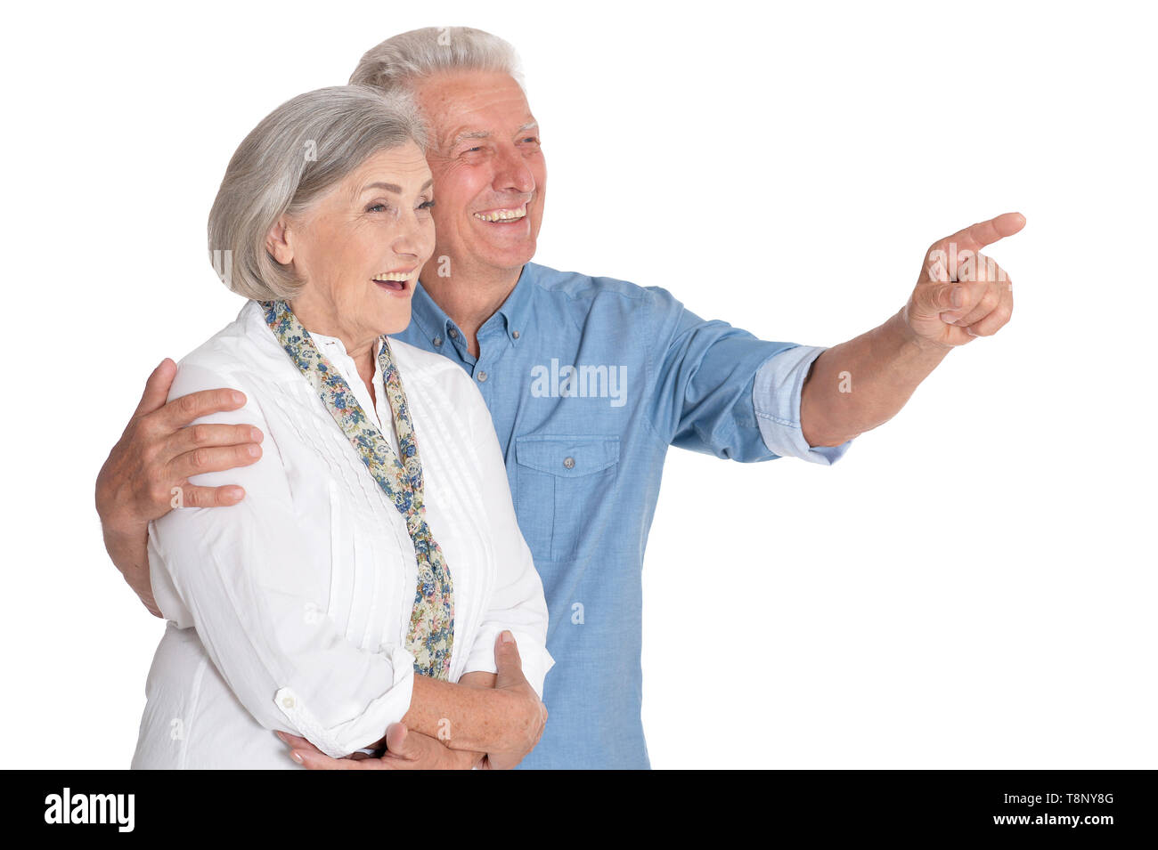 Portrait of happy senior couple isolated on white background Stock Photo