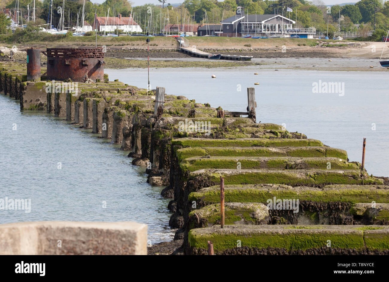 The remains of the old Hayling Island railway bridge at Langstone Harbour, part of Chichester Harbour Stock Photo