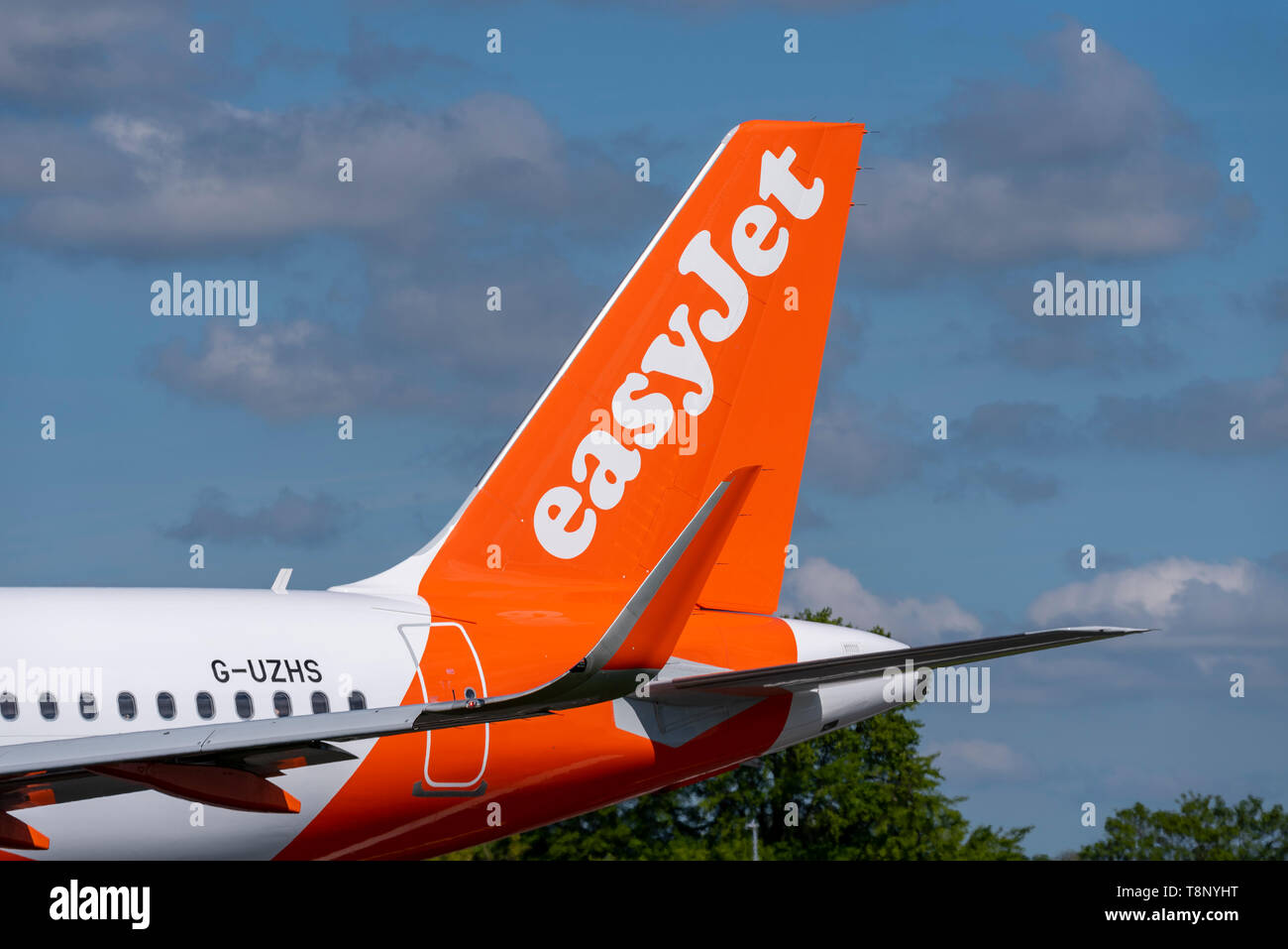 easyJet Airbus A321 jet airliner plane G-UZHS at London Southend Airport, Essex, UK. Budget airline. Tail with logo titles Stock Photo