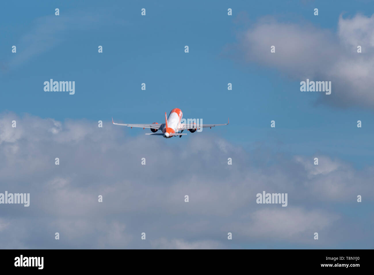 easyJet Airbus A321 jet airliner plane G-UZHS climbing out after take off at London Southend Airport Essex, UK. Budget airline. Climb out. Flying away Stock Photo