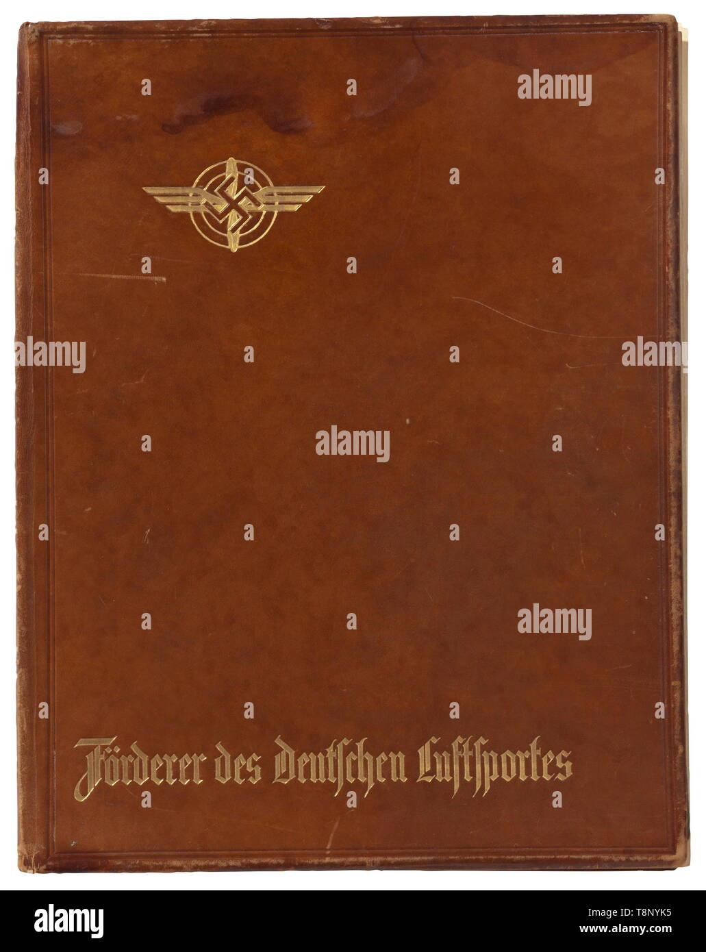 An honour book of the promoters of German aerial sports 1933 Large-sized, brown leather folder with gold-imprinted DLV emblem and inscription 'Förderer des deutschen Luftsportes'. On the flyleaf preamble for the foundation of the DLV by Bruno Loerzer. On the following pages signatures and dedications by - amongst others - Adolf Hitler, Rudolf Heß, Hermann Göring - 'Im Geiste der Richthofen und Boelcke vorwärts!' (tr. In the spirit of Richthofen and Boelcke - Go ahead!), Erhard Milch, Friedrich Christiansen, Ernst Udet, Josef Goebbels, Julius Stre, Additional-Rights-Clearance-Info-Not-Available Stock Photo