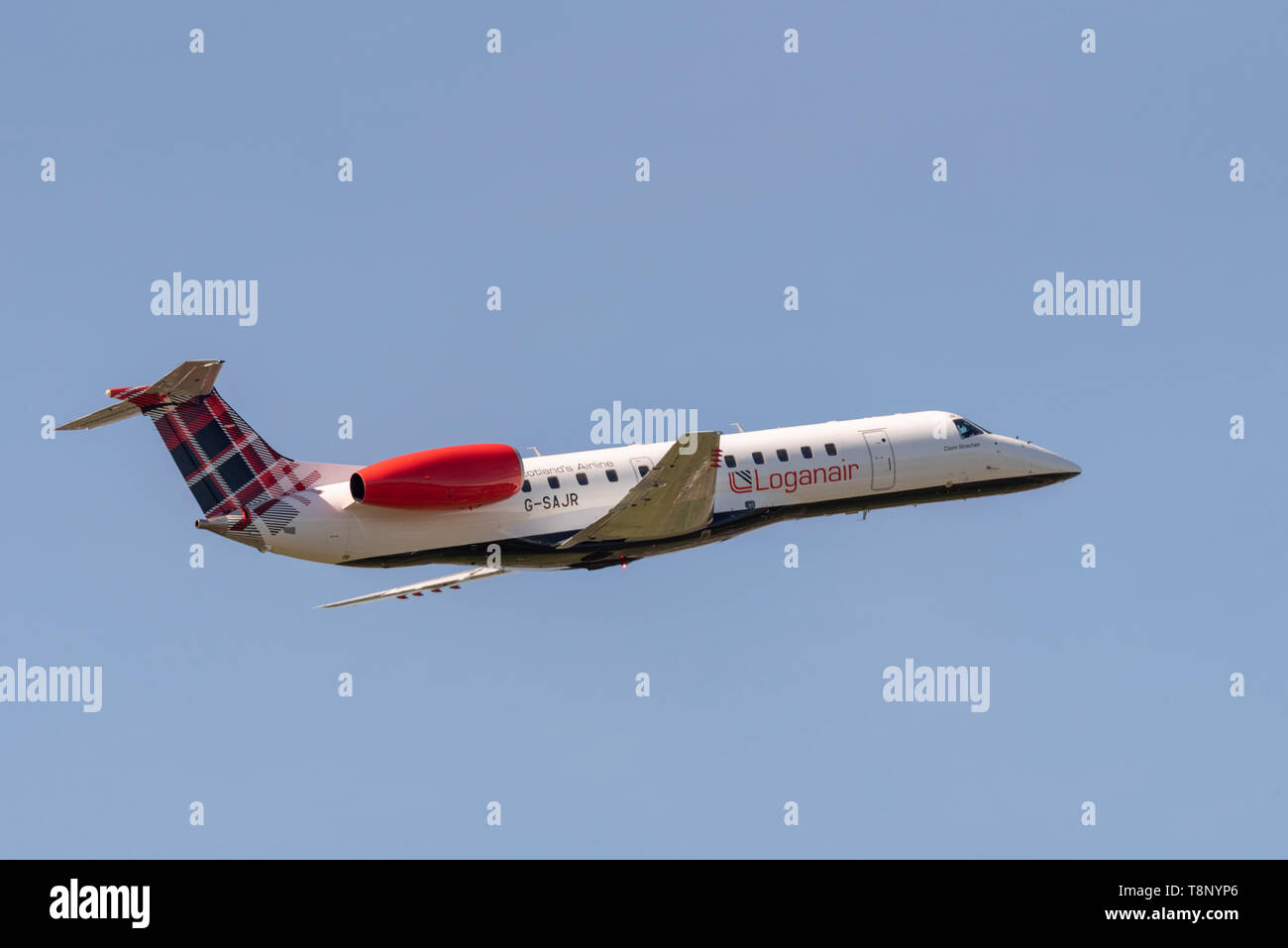 Loganair Embraer ERJ135 climbing out after take off at London Southend Airport, Essex, UK. Climb out. Flying away Stock Photo