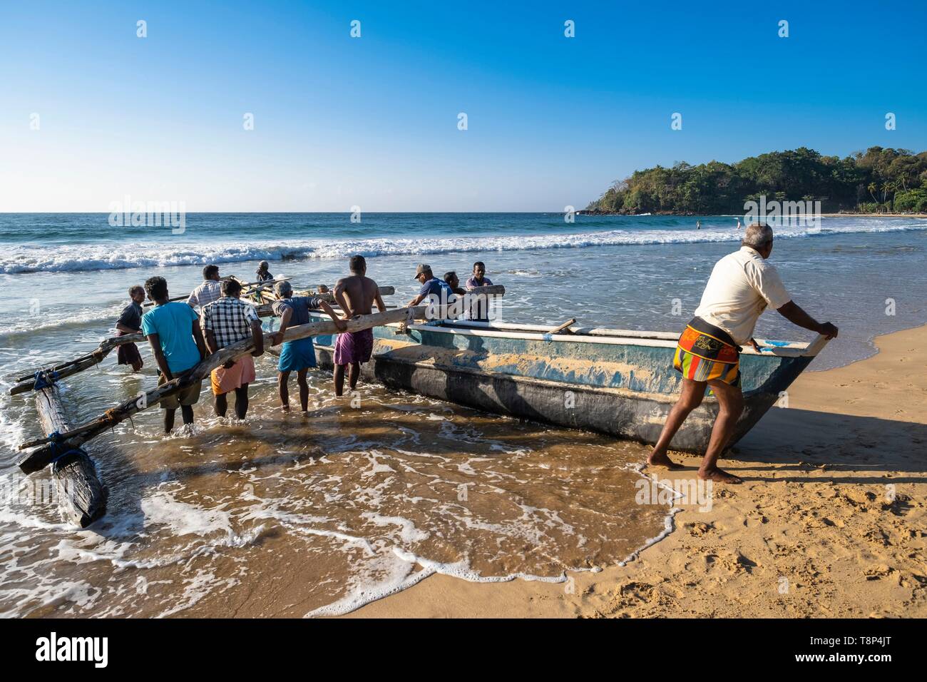 Woman pulling boat hi-res stock photography and images - Alamy