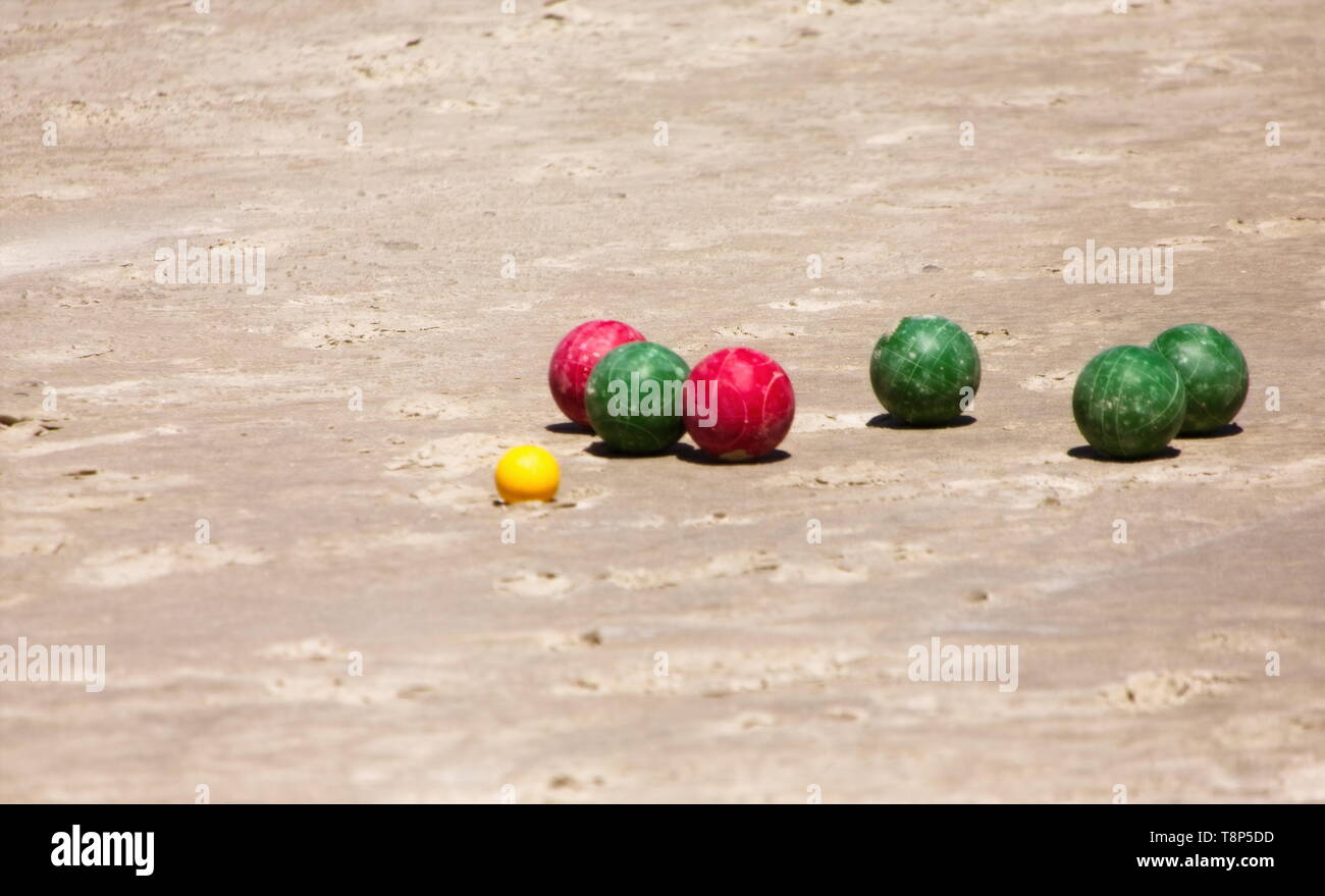 Green and Red Bocce Balls on Beach Stock Photo Alamy