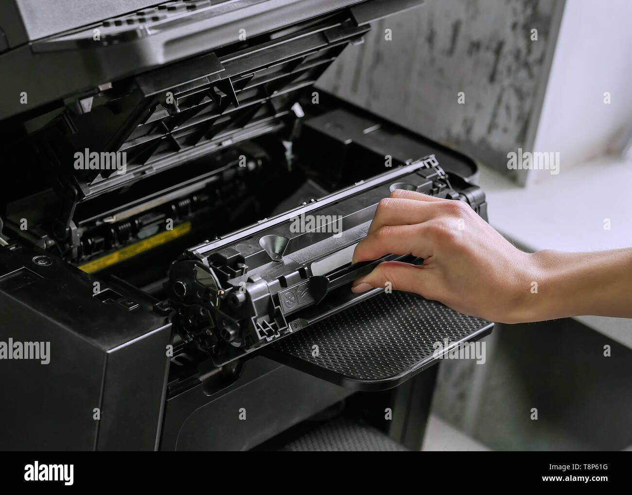 replacing the cartridge in the laser printer Stock Photo