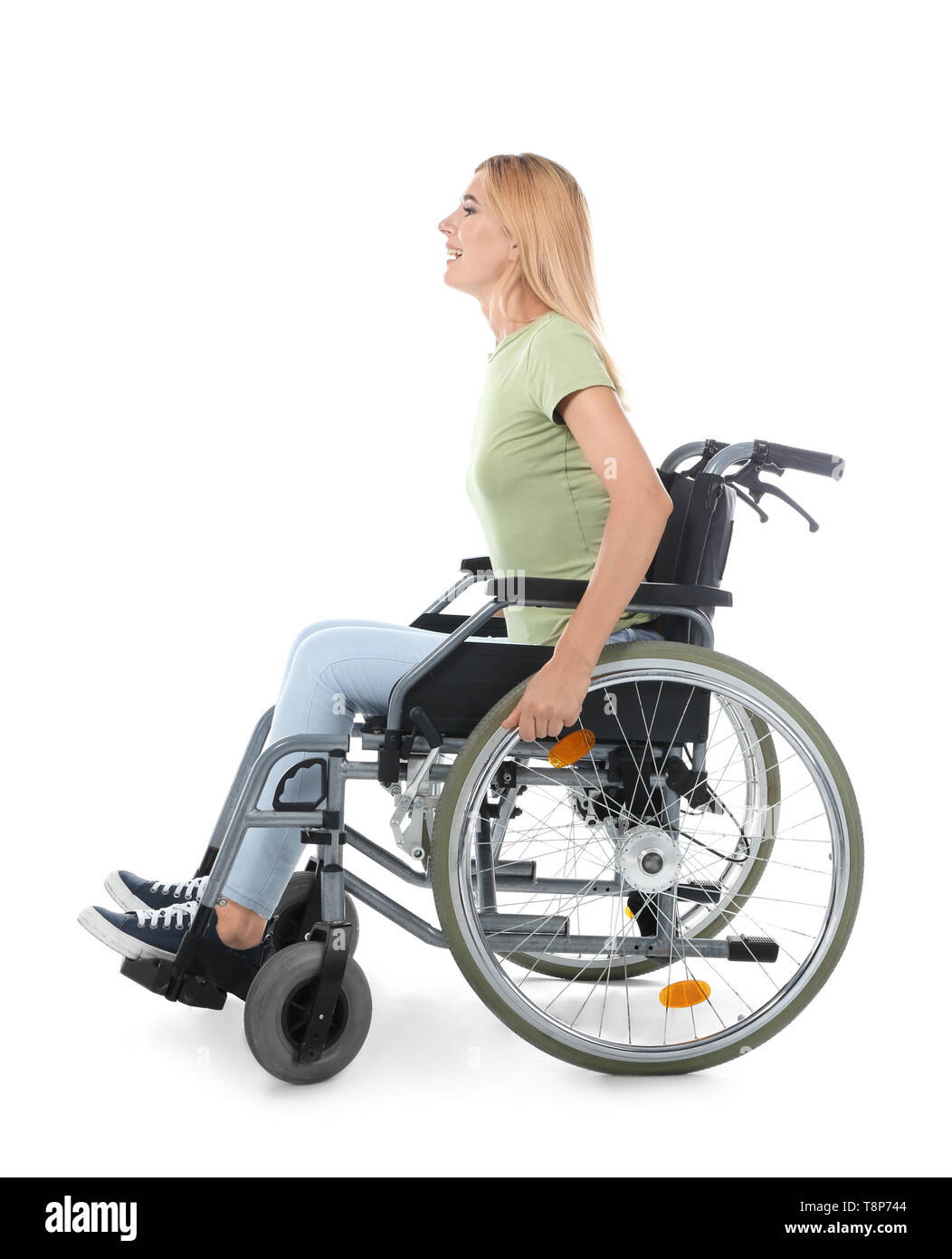 Beautiful woman in wheelchair on white background Stock Photo - Alamy