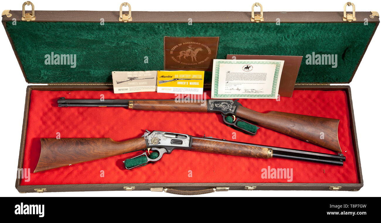 A Marlin Centennial 1870 - 1970 Matched Pair Mod. 39 + Mod. 336 Presentation, 'Brace of One Thousand', USA, in case Proof-marked 3/1971. Cal..22 S,L & LR/.30-30 Win. Serial no. 111 each. Octagonal barrels, bright bores, length 20'. Model and corporate name on barrels, calibre on left side of barrel roots, on right side 'Brace of One Thousand'. Action cases ornamentally engraved on both sides, on the left bison and '1870', on the right golden badge 'Marlin 1870'. Complete original black finish. Gilded triggers. Selected two-part walnut stocks, pol, Additional-Rights-Clearance-Info-Not-Available Stock Photo