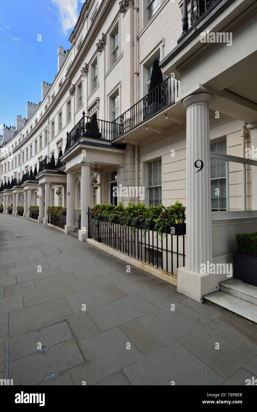 Luxury stucco fronted west london terraced residences, Grosvenor Crescent, Belgravia, West London, United Kingdom Stock Photo