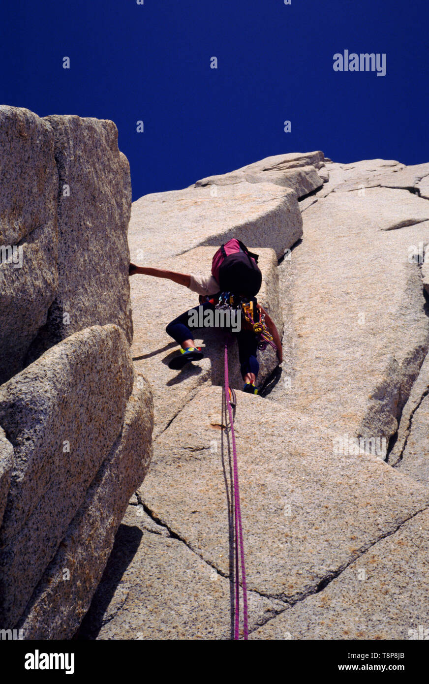 The Norwegian climber Tor Tiller is leading up the steep rock face of the Maestri route on the mountain Cerro Torre in Los Glaciares national park, Patagonia, Argentina. January, 1993. Stock Photo