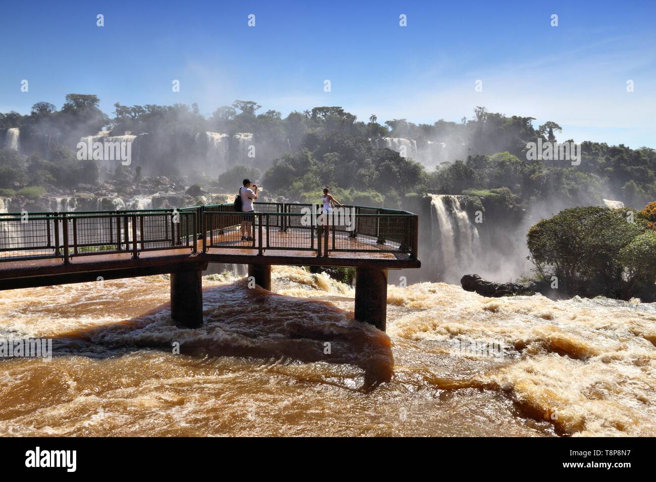 IGUACU NATIONAL PARK, BRAZIL - OCTOBER 9, 2014: People visit Iguacu National Park in Brazil. The park was established in 1939 and is a UNESCO World He Stock Photo