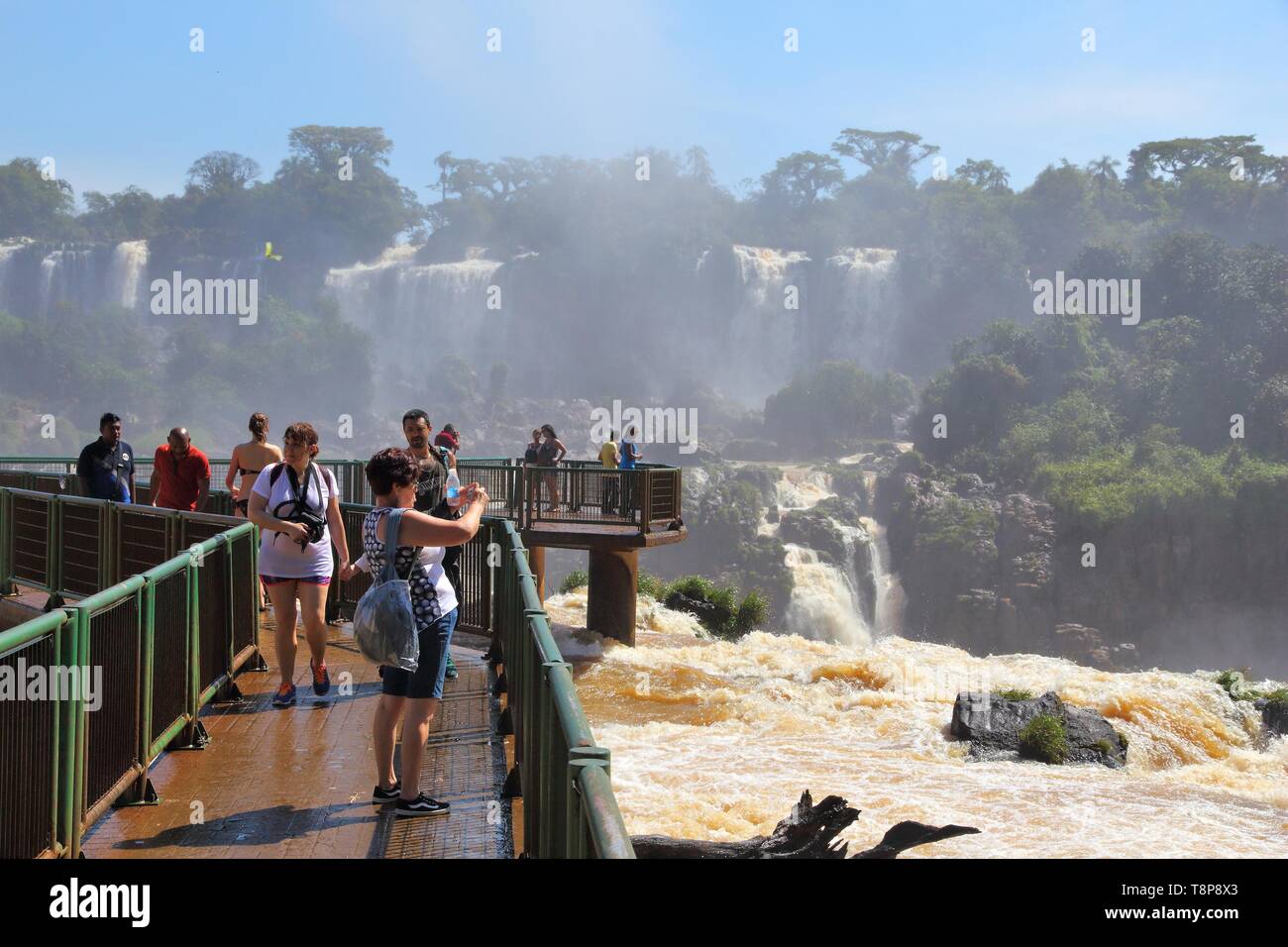 IGUACU NATIONAL PARK, BRAZIL - OCTOBER 9, 2014: People visit Iguacu National Park in Brazil. The park was established in 1939 and is a UNESCO World He Stock Photo