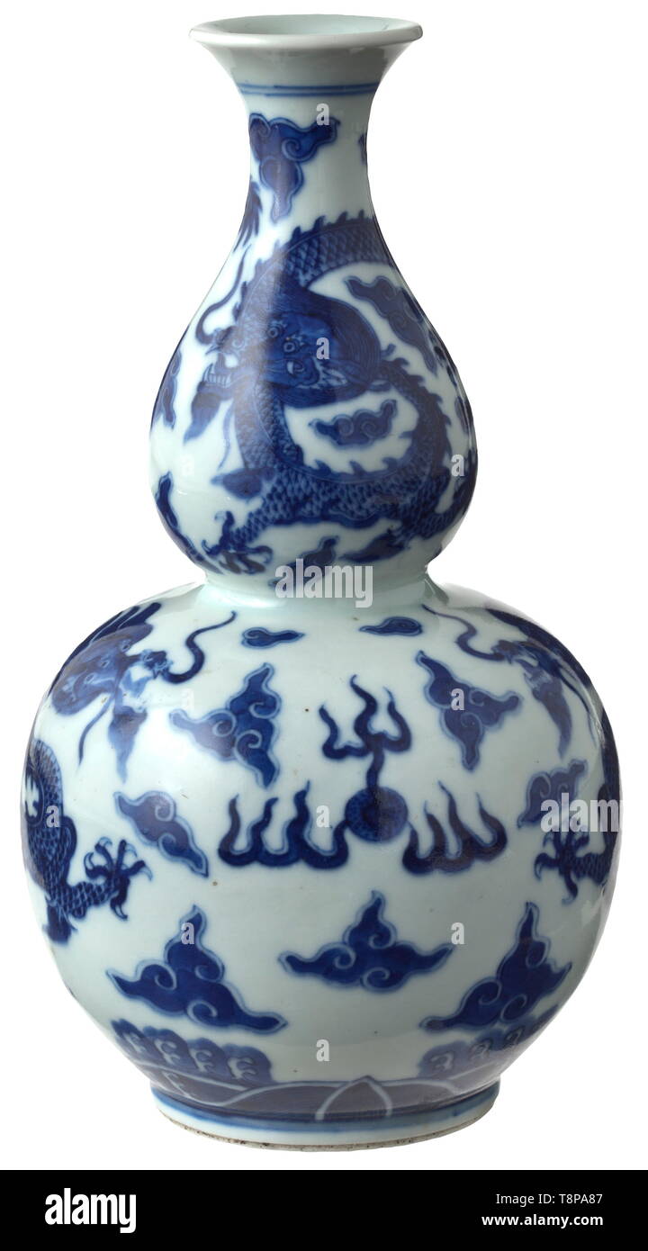 A blue white baluster vase Qianlong Period 1736 96 White a blue white baluster vase qianlong period 1736 96 white porcelain with blue underglaze depicting dragons between clouds over the ocean on the base a blue underglaze quianlong mark fine undamaged condition height 22 cm provenance south german private collection purchased in the s historic historical china chinese 18th century additional rights clearance info not available image