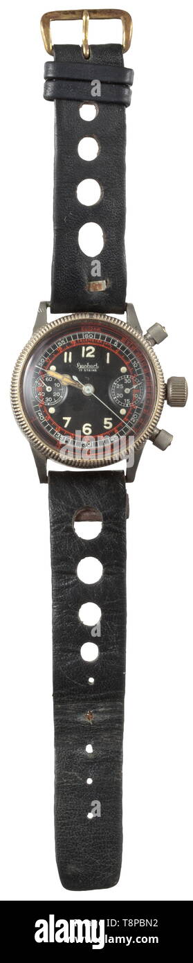 A chronograph manufactured by Hanhart Naval aviator and crew member of the only German aircraft carrier 'Graf Zeppelin'. Nickel-plated case, black dial (Hanhart - 17 jewels), luminous numerals and hands, small second hand, mark on the bezel. Two-pusher stopwatch mechanism, with results shown by second hand and 30-minute counter, manual winding. Screwable lid, the high-grade steel back punched 'Wassergeschützt' (waterproof) and 'Stossfest' (shock resistant). On a contemporary, black leather watch band showing signs of usage. Comes with the original presentation case of the c, Editorial-Use-Only Stock Photo