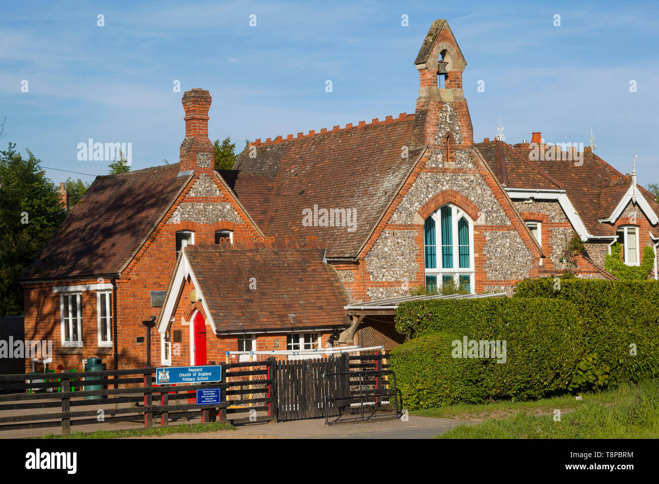 The traditional Victorian brick and flint school building, still in use at Peppard, Oxfordshire Stock Photo
