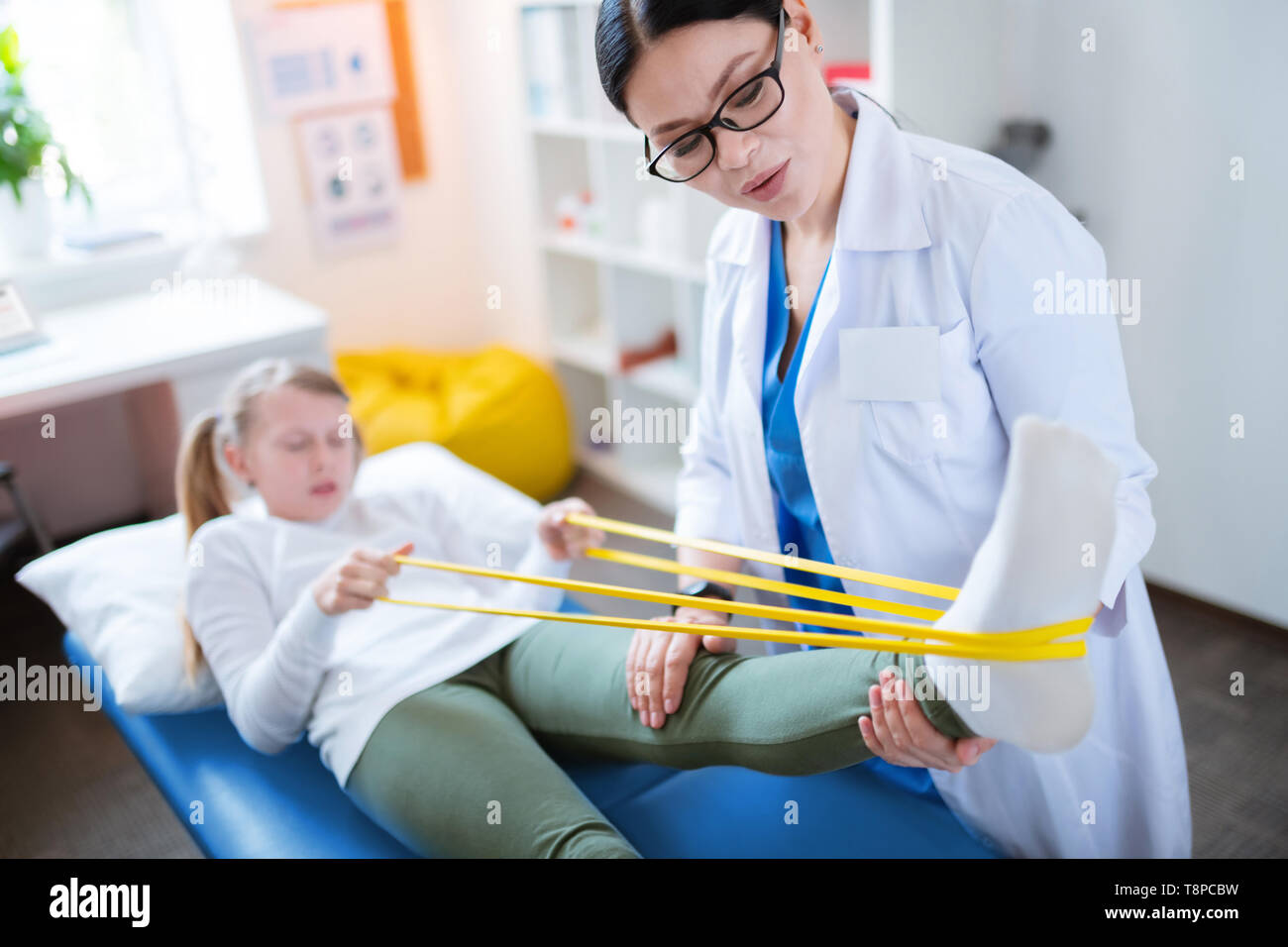 Asian teenager and doctor hi-res stock photography and images - Alamy