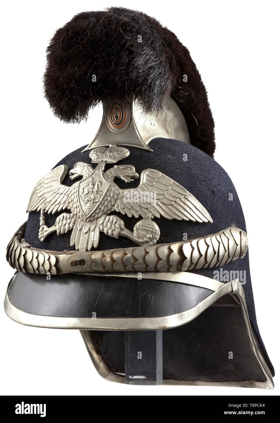 A Russian helmet for the Special Corps of the mounted country, fortress, division and railway police, from 1911 onwards Felt body, leather front visor, silver-coloured comb with horsehair crest, leather-backed chinscales, rosettes with the tsarist double-headed eagle. Applied, silver-plated double-headed eagle. Leather sweatband. Good condition. historic, historical, 20th century, Additional-Rights-Clearance-Info-Not-Available Stock Photo