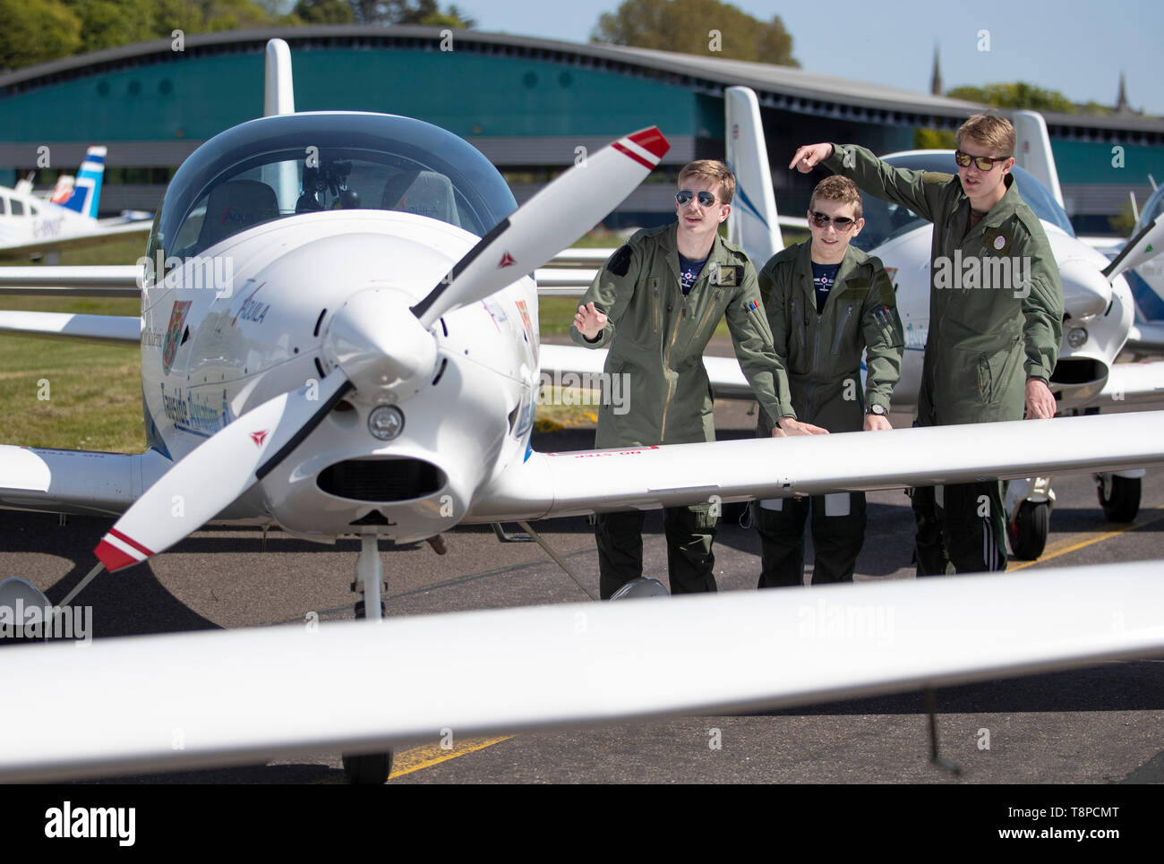 (left to right) RAF cadets Arthur Chandler, Barney Jones-Evans and Joel Pilkington help to unveil a quartet of aircraft commemorating one of the most poignant tales of wartime Britain which they'll be learning to fly in at Tayside Aviation, Dundee. Stock Photo
