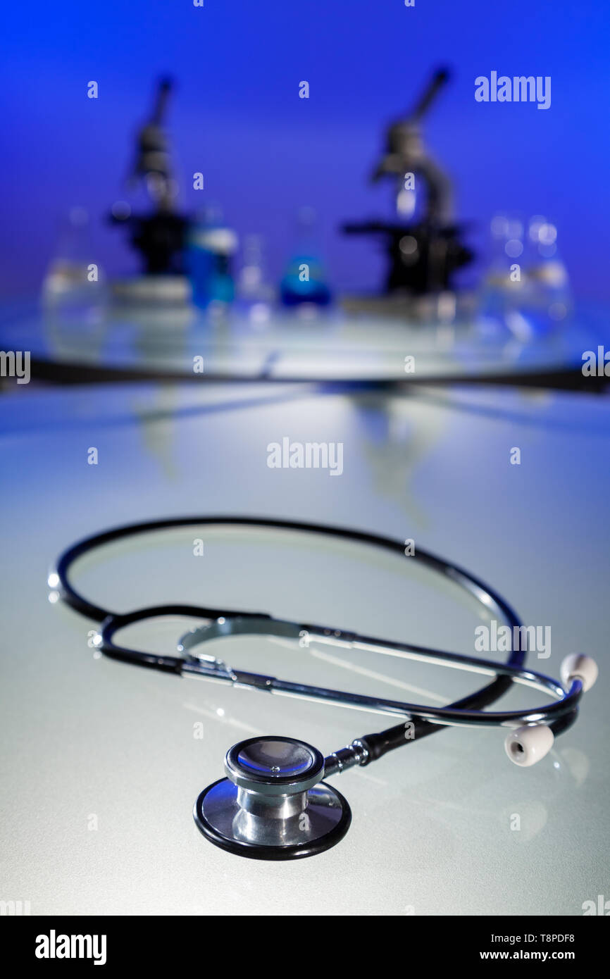 Stethoscope, microscopes and medical equipment in a hospital laboratory environment Stock Photo