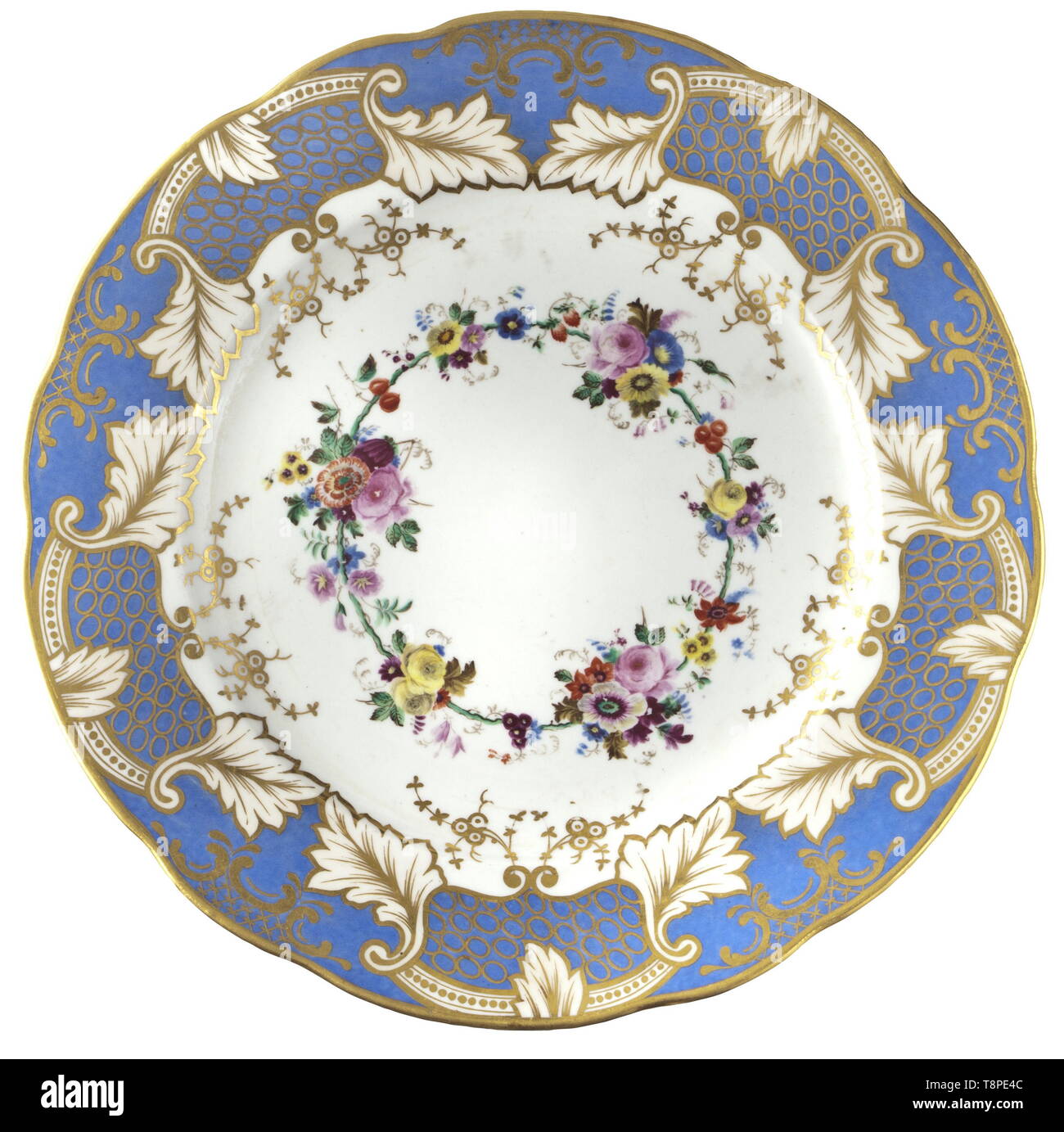 A plate from the table service of Grand Duchess Olga Nikolaevna Romanova, Imperial Russian Porcelain Manufactory St. Petersburg, circa 1840 White, glazed porcelain, the light blue border with golden cartouches and foliage decoration, the centre decorated with hand-painted flowers. On the bottom the steel-blue underglaze mark 'N I' of the Imperial Manufactory St. Petersburg. Diameter 25 cm. The service was a gift of her father, Tsar Nicholas I, and part of her dowry. Of excellent preservation and workmanship. Provenance: Grand Duchess Olga Nikolae, Additional-Rights-Clearance-Info-Not-Available Stock Photo