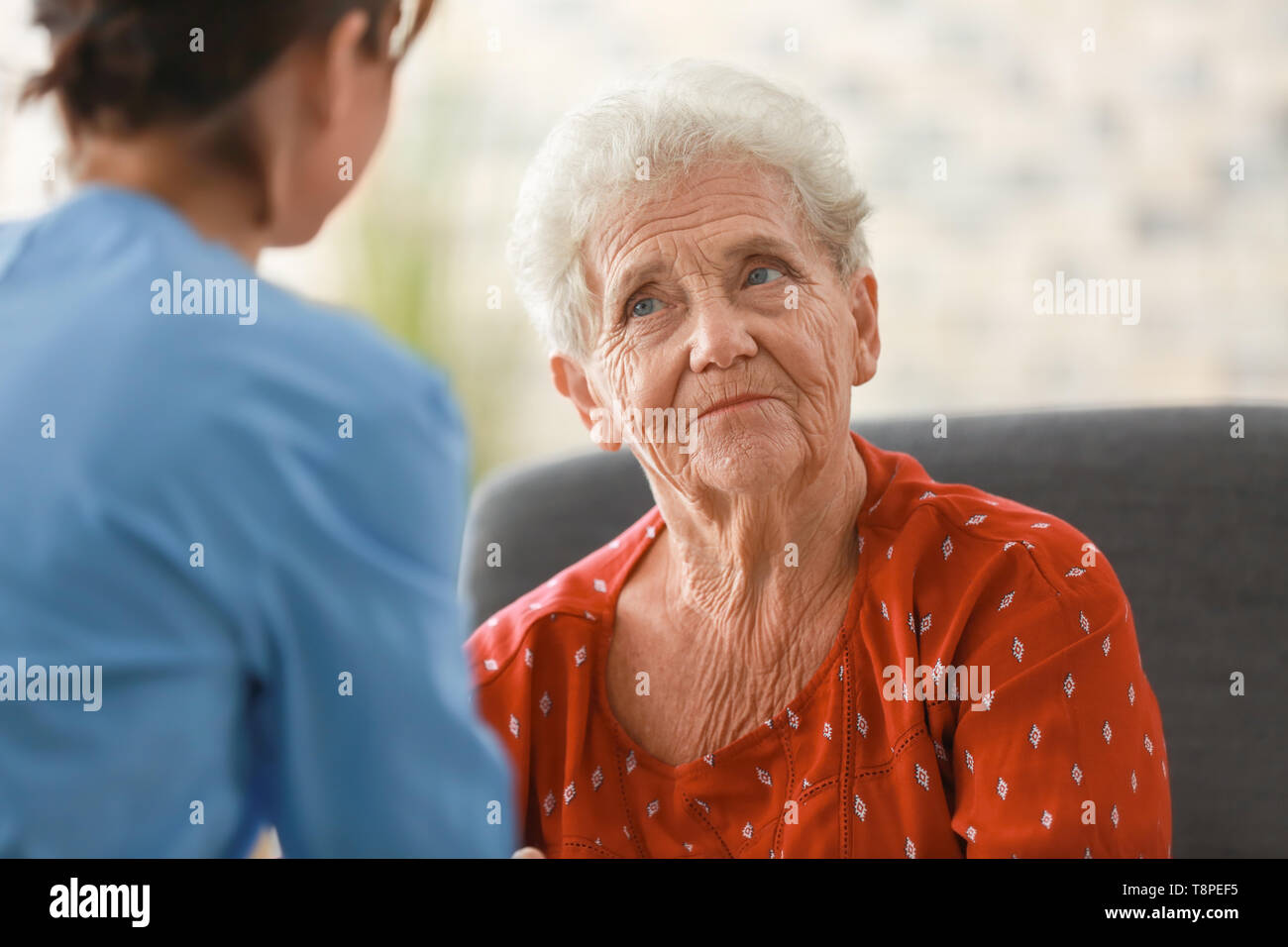 Care home elderly young people visiting hi-res stock photography and ...