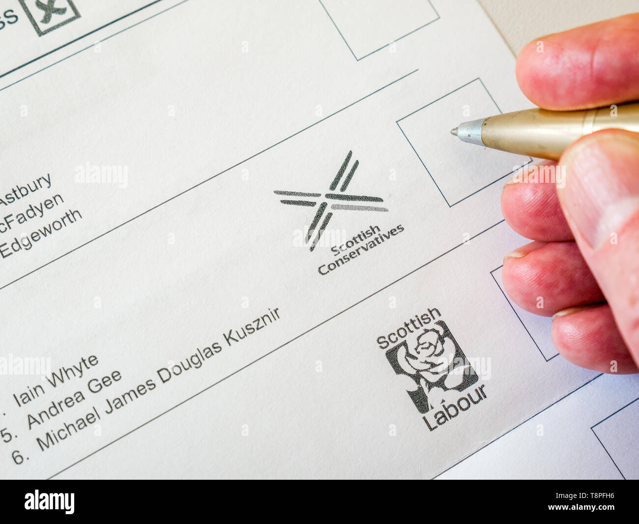 Man voting on ballot paper for  Scottish Conservative party in European Parliament election, Scotland, May 2019 Stock Photo