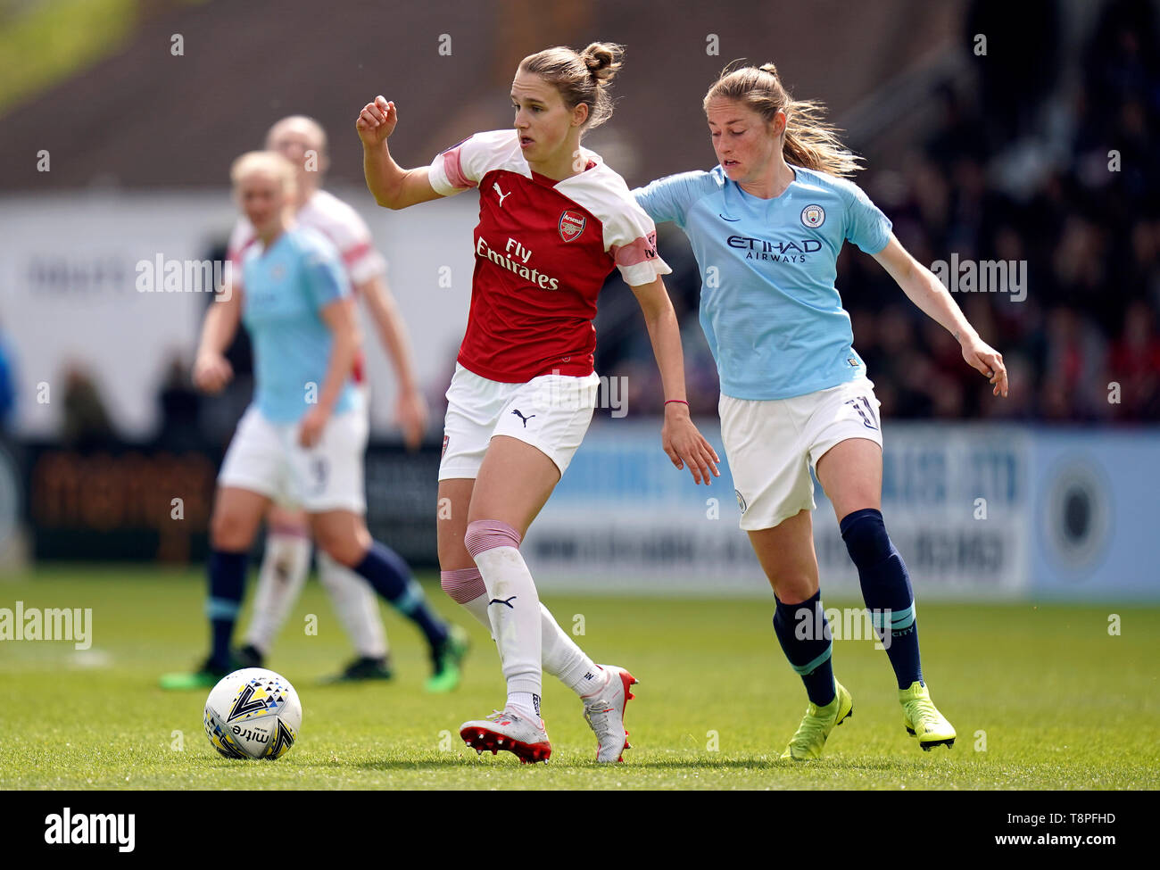 Arsenal's Vivianne Miedema (left) and Manchester City's Janine Beckie ...