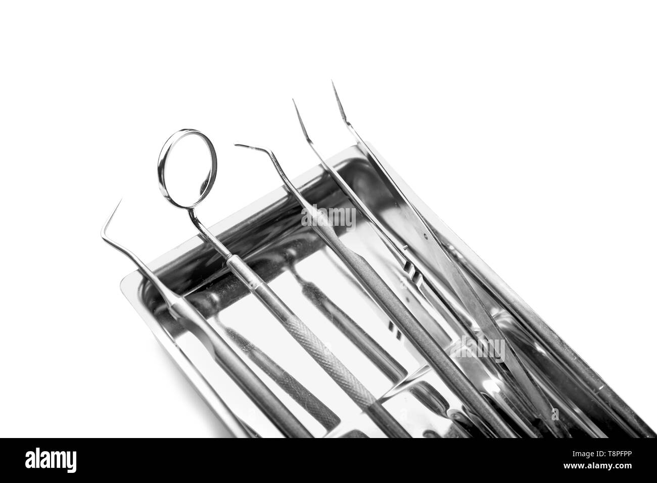 Tray with dental instruments on white background Stock Photo Alamy