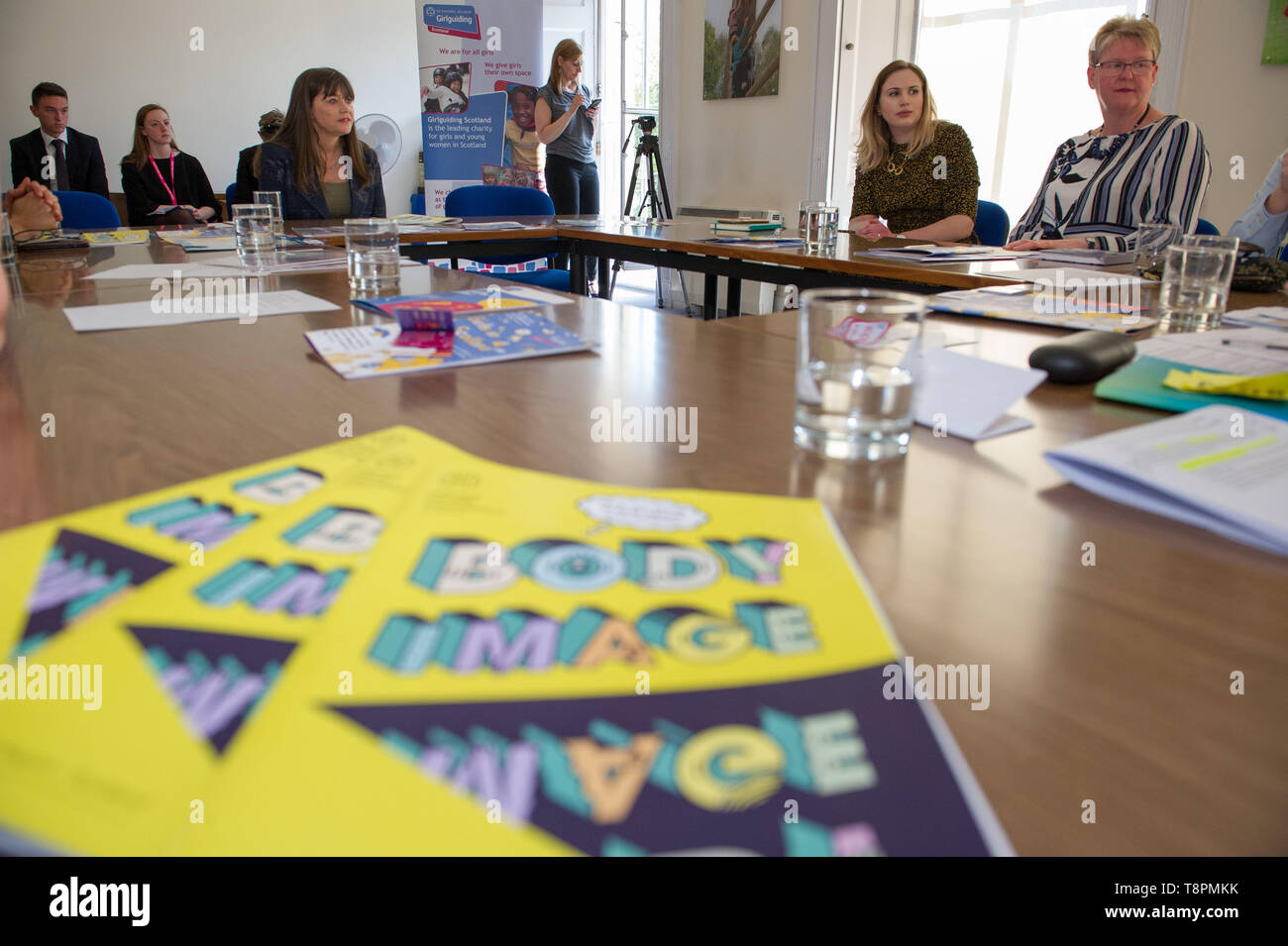 Edinburgh, UK. 14 May 2019. Mental Health Minister, Clare Haughey, joins Girlguiding Scotland members at Girlguiding HQ to discuss the impact of body image on mental health and wellbeing.  Ms Haughey announces the remit of the new Advisory Group on MEntal Body Image, which will identify steps to improve support for young people.  The Minister meets with Girlguides of all ages to discuss their experience of body image and how this can affect their mental health, and about any other pressures that impact them. Credit: Colin Fisher/Alamy Live News. Stock Photo