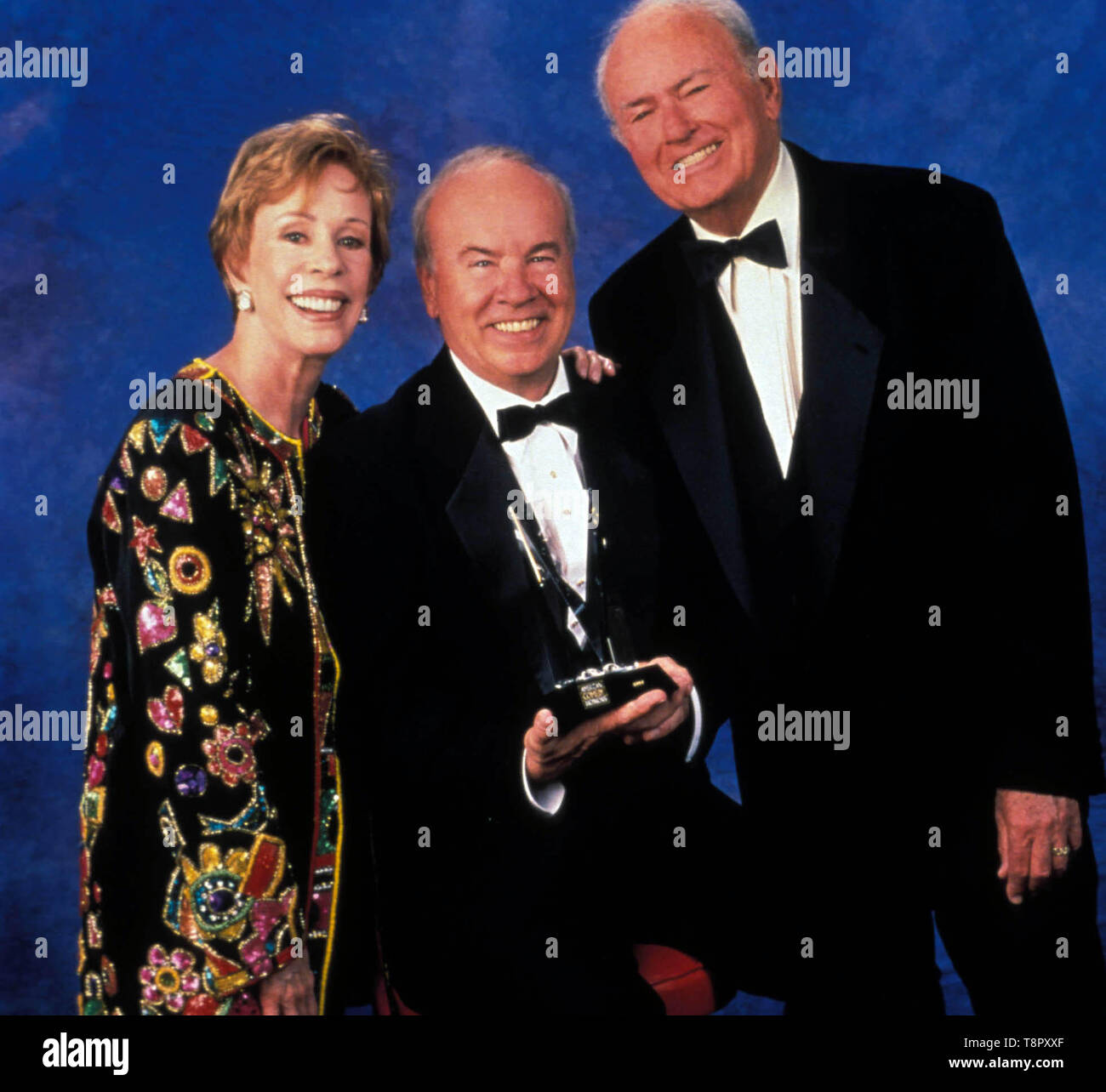 May 14, 2019: Los Angeles, California USA: FILE: Actor and comedian TIM CONWAY, best known for his Emmy winning work on 'The Carol Burnett Show, ' died on Tuesday morning. He was 85. PICTURED: CAROL BURNETT, TIM CONWAY and HARVEY KORMAN at the American Comedy Awards, circa 1990's. Credit: Globe Photos/ZUMAPRESS.com/Alamy Live News Stock Photo