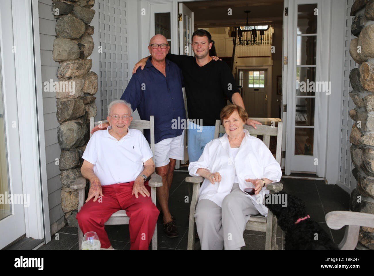 (190514) -- NEW YORK, May 14, 2019 (Xinhua) -- James E. Bryant (L, front), his wife Dorothy Bryant (R, front), son James Bryant (L, rear) and grandson Ben Bryant are pictured in Marblehead, Massachusetts, the United States, 2015. James Bryant will never forget the day when his 93-year-old father went back to his bedroom and came back with a flight brief case containing papers related to the training and assignments he took as a U.S. Flying Tiger pilot during the World War II. As a 'remarkable' yet 'humble' man and a loving father, James E. Bryant did not show any detailed evidence about his w Stock Photo