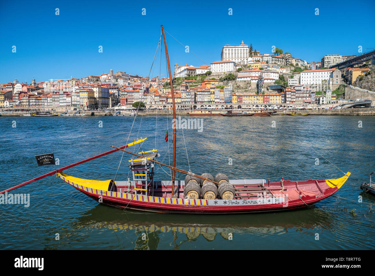 Douro River waterfront in Gaia with Barrio La Ribeira across river and Rabelo Boats. Portugal . Stock Photo