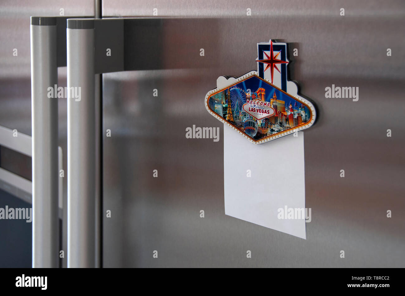 Las Vegas Fridge Magnet with blank notelet attached on a modern stainless steel fridge Stock Photo