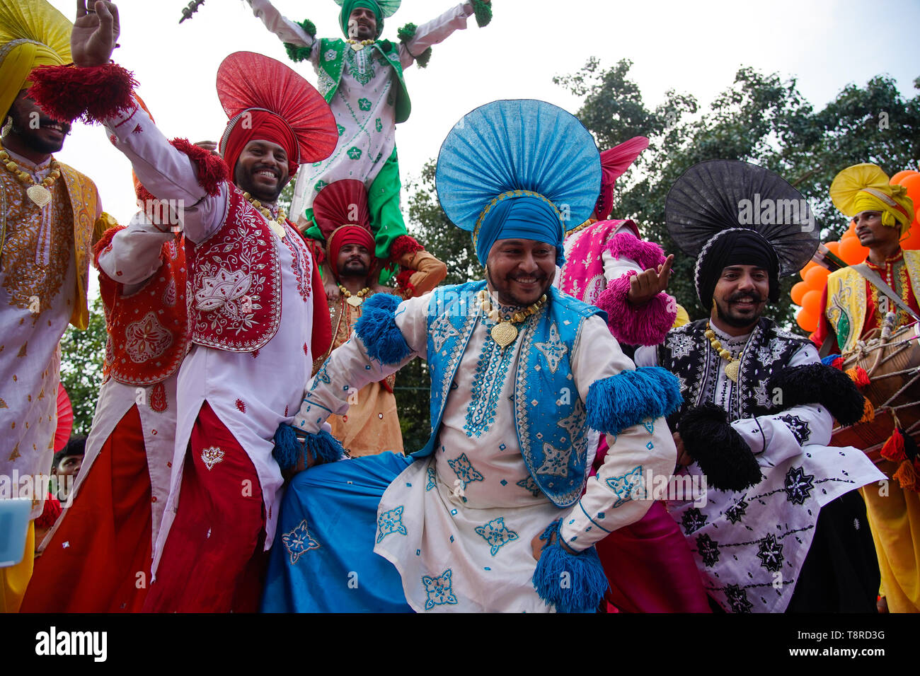 Performers seen dressed in traditional costumes while dancing during the Show in Kolkata. Bharatiya Janata Party (BJP) president Amit Shah on Tuesday held a mega roadshow in Kolkata with support of party's candidates ahead of the final phase of Lok Sabha polls. Stock Photo